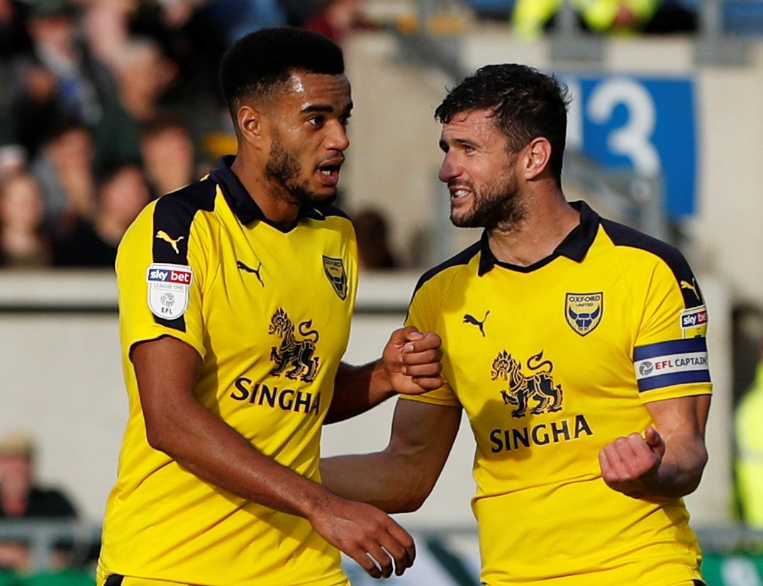 Soccer Football - League One - Oxford United v Plymouth Argyle - Kassam Stadium, Oxford, Britain - October 13, 2018   Oxford's Curtis Nelson celebrates scoring their second goal with John Mousinho   Action Images/Paul Childs    EDITORIAL USE ONLY. No use with unauthorized audio, video, data, fixture lists, club/league logos or 