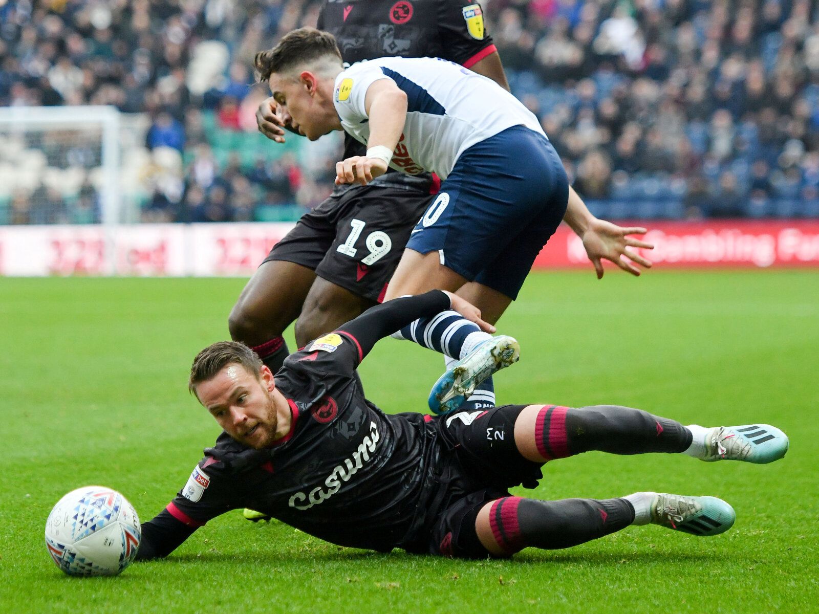 Soccer Football - Championship - Preston North End v Reading - Deepdale, Preston, Britain - December 29, 2019   Preston's Josh Harrop in action with Reading's Chris Gunter   Action Images/Paul Burrows    EDITORIAL USE ONLY. No use with unauthorized audio, video, data, fixture lists, club/league logos or 
