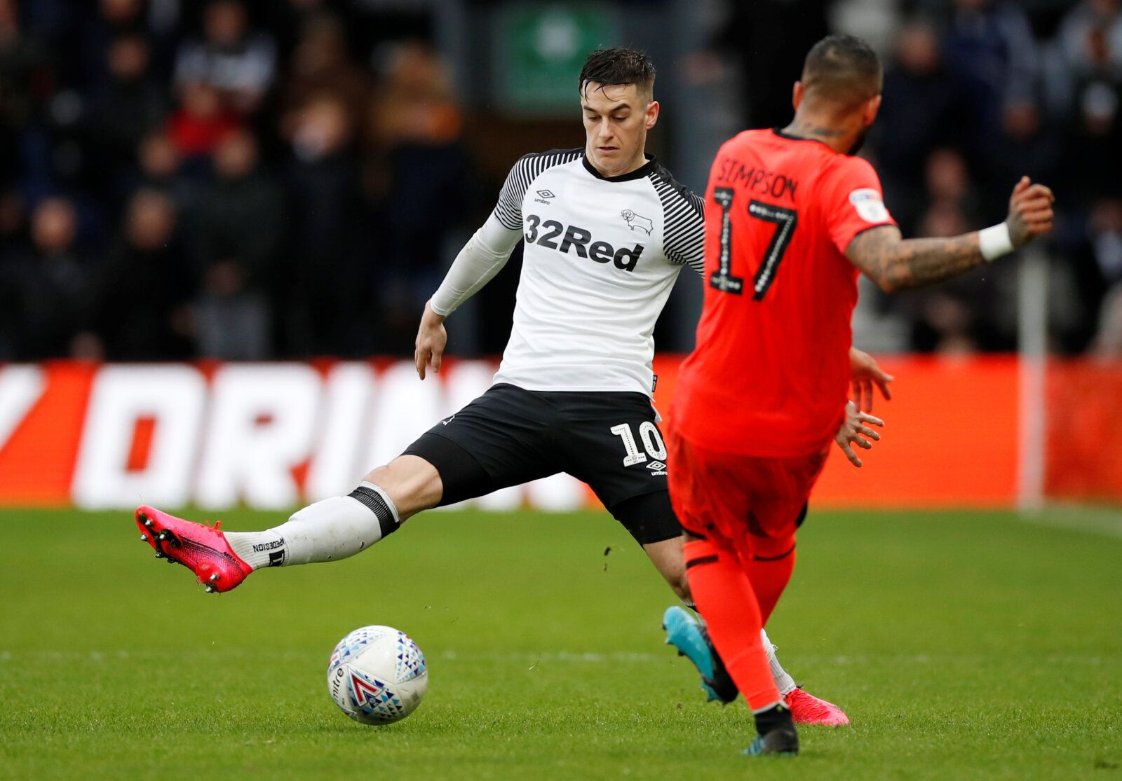 Soccer Football - Championship - Derby County v Huddersfield Town - Pride Park, Derby, Britain - February 15, 2020   Derby County's Tom Lawrence in action with Huddersfield Town's Danny Simpson   Action Images/Andrew Boyers    EDITORIAL USE ONLY. No use with unauthorized audio, video, data, fixture lists, club/league logos or 