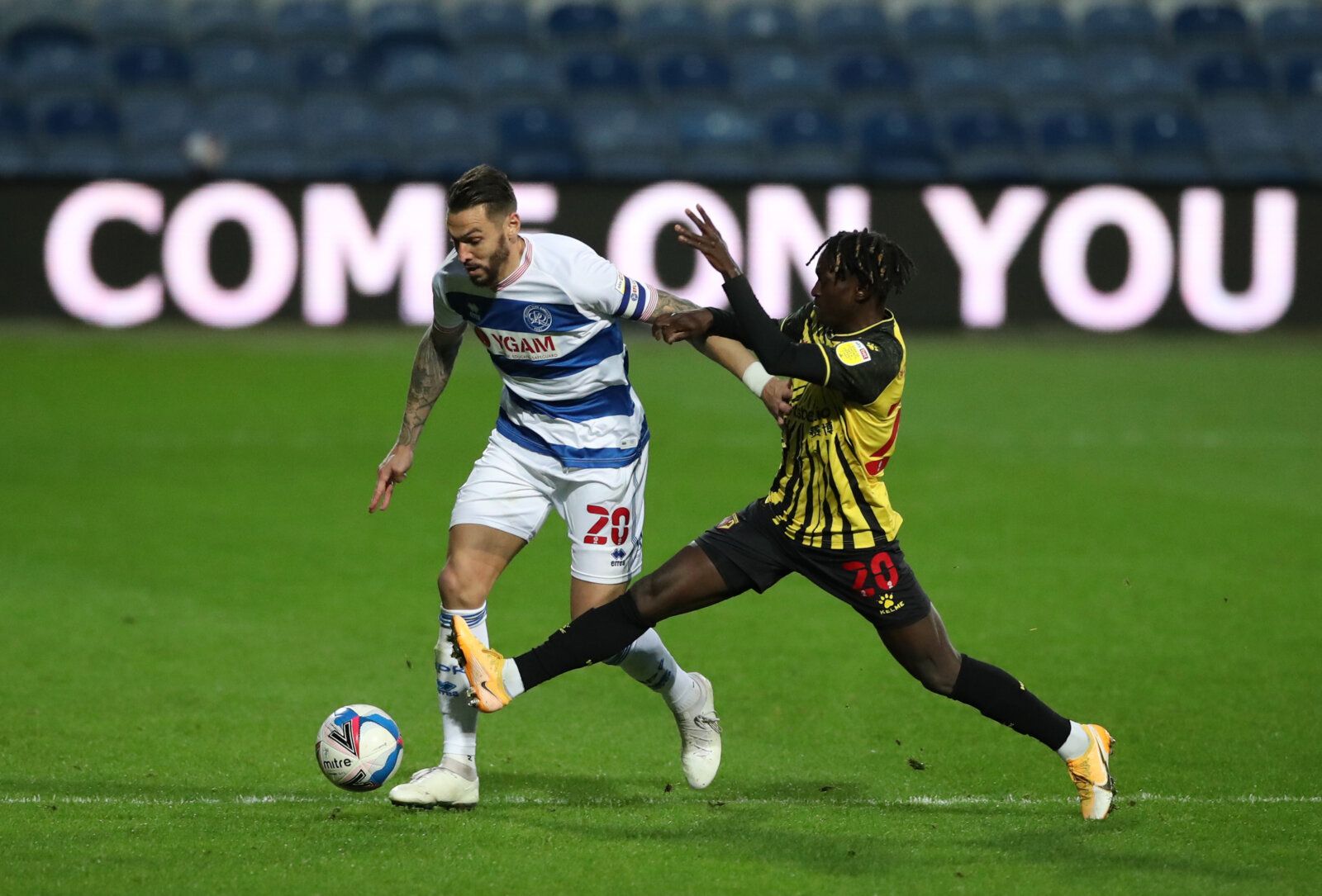 Soccer Football - Championship - Queens Park Rangers v Watford - Loftus Road, London, Britain - November 21, 2020 QPR's Geoff Cameron in action with Watford's Domingos Quina Action Images/Peter Cziborra EDITORIAL USE ONLY. No use with unauthorized audio, video, data, fixture lists, club/league logos or 'live' services. Online in-match use limited to 75 images, no video emulation. No use in betting, games or single club /league/player publications.  Please contact your account representative for 