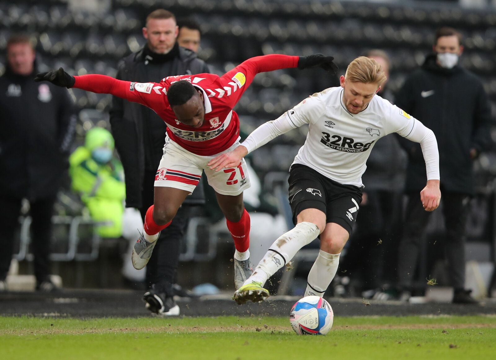 Soccer Football - Championship - Derby County v Middlesbrough - Pride Park, Derby, Britain - February 13, 2021 Middlesbrough's Neeskens Kebano in action with Derby County's Kamil Jozwiak Action Images/Molly Darlington EDITORIAL USE ONLY. No use with unauthorized audio, video, data, fixture lists, club/league logos or 'live' services. Online in-match use limited to 75 images, no video emulation. No use in betting, games or single club /league/player publications.  Please contact your account repr