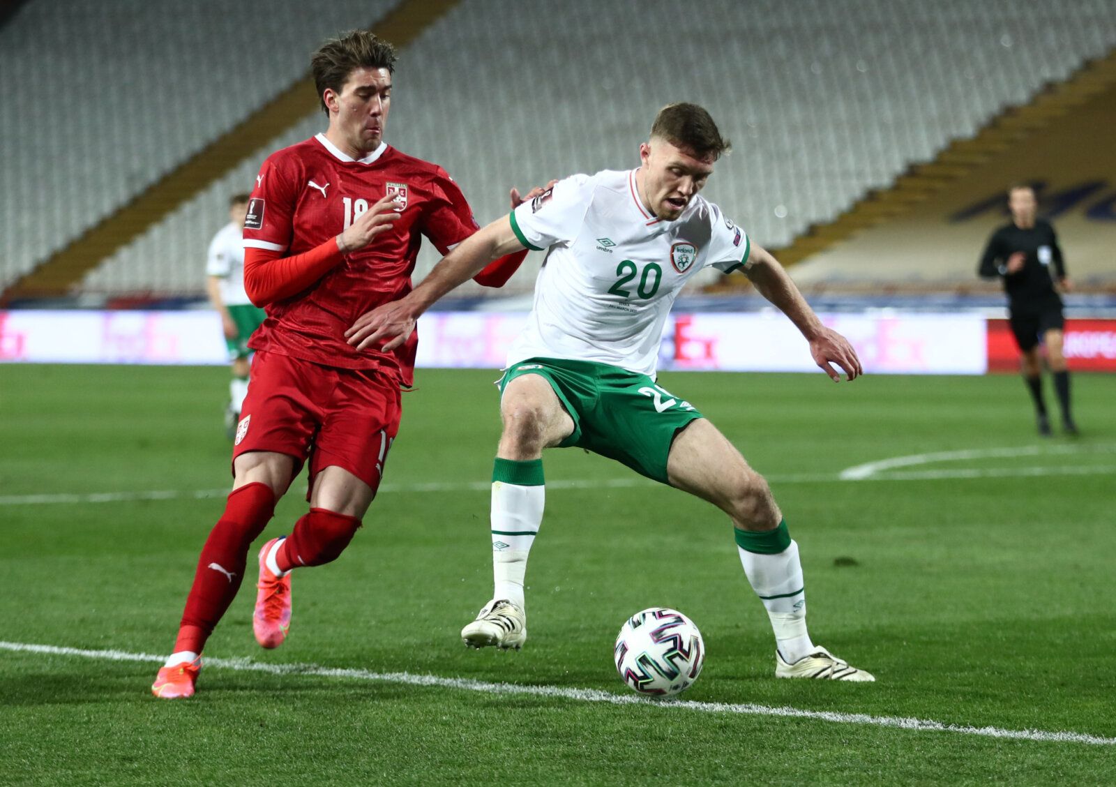 Soccer Football - World Cup Qualifiers Europe - Group A - Serbia v Republic of Ireland - Rajko Mitic Stadium, Belgrade, Serbia - March 24, 2021 Republic of Ireland's Dara O'Shea in action with Serbia's Dusan Vlahovic REUTERS/Marko Djurica