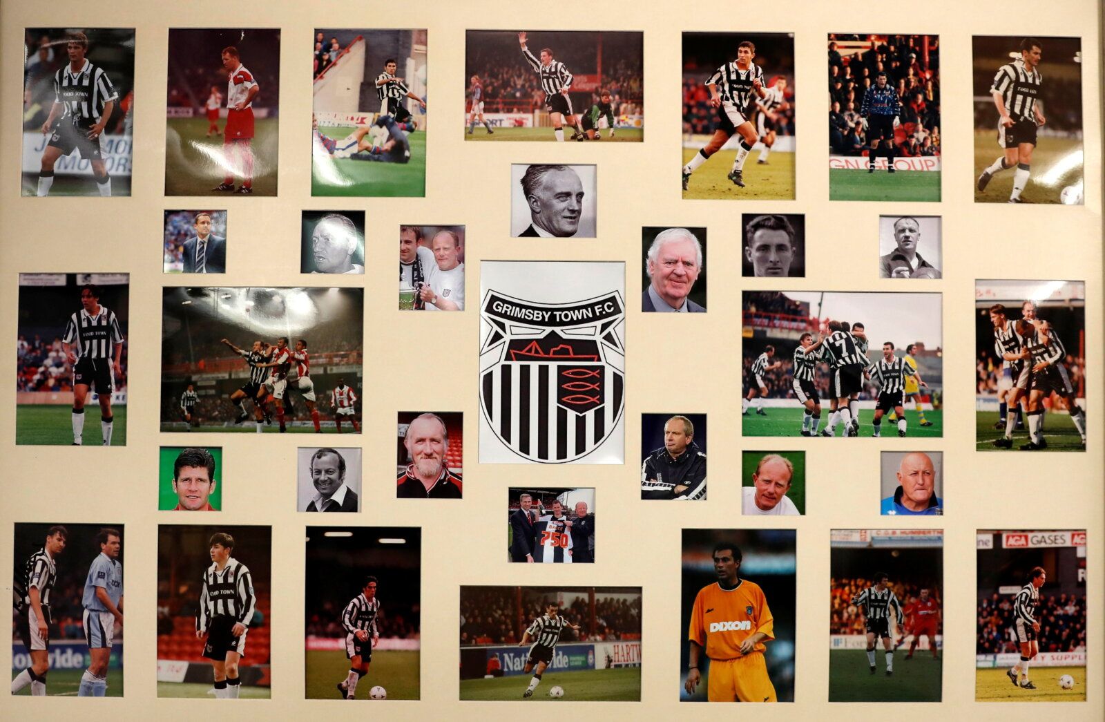 Soccer Football - National League - Grimsby Town v FC Halifax Town - Blundell Park, Cleethorpes, Britain - January 3, 2022 General view of a framed print of former Grimsby Town players and managers before the match Action Images/Lee Smith  EDITORIAL USE ONLY. No use with unauthorized audio, video, data, fixture lists, club/league logos or 