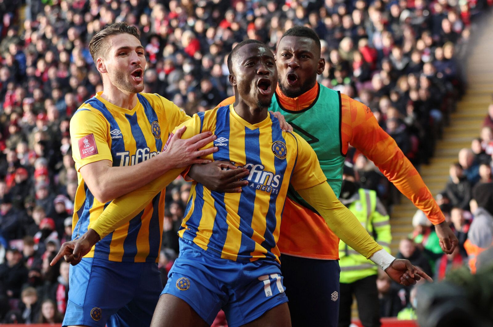 Soccer Football - FA Cup Third Round - Liverpool v Shrewsbury Town - Anfield, Liverpool, Britain - January 9, 2022 Shrewsbury Town's Daniel Udoh celebrates scoring their first goal with Luke Leahy REUTERS/Phil Noble