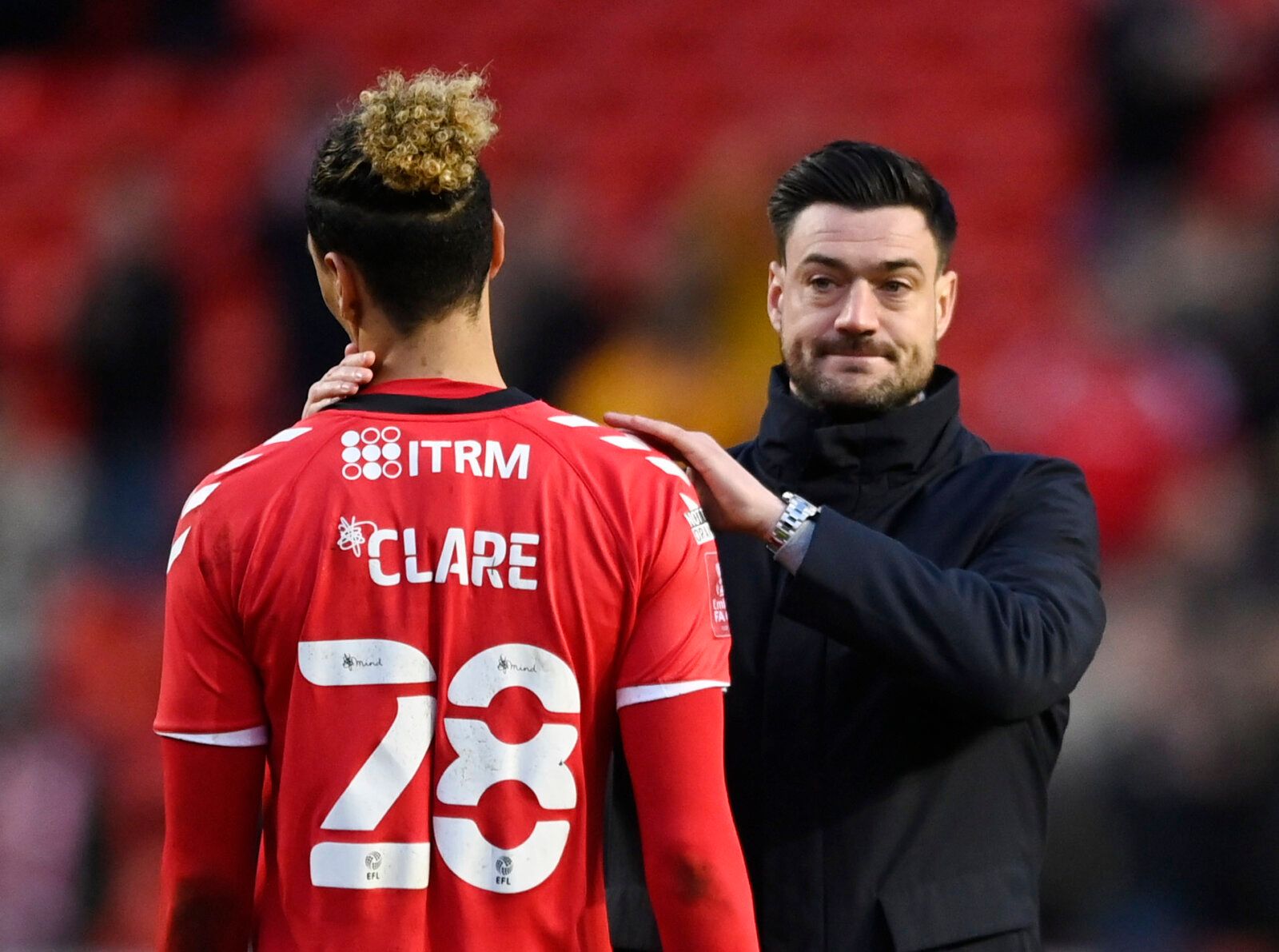 Soccer Football - FA Cup Third Round - Charlton Athletic v Norwich City - The Valley, London, Britain - January 9, 2022 Charlton Athletic manager Johnnie Jackson with Sean Clare after the match REUTERS/Tony Obrien