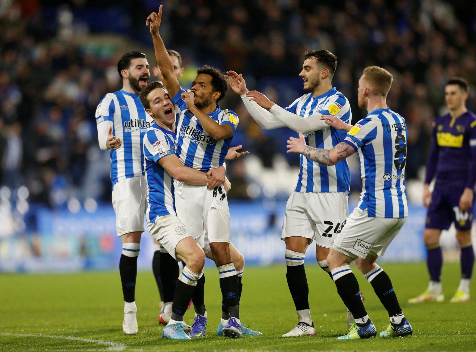 Soccer Football - Championship - Huddersfield Town v Derby County - John Smith's Stadium, Huddersfield, Britain - February 2, 2022 Huddersfield Town's Duane Holmes celebrates scoring their first goal with Carel Eiting   Action Images/Ed Sykes EDITORIAL USE ONLY. No use with unauthorized audio, video, data, fixture lists, club/league logos or 'live' services. Online in-match use limited to 75 images, no video emulation. No use in betting, games or single club /league/player publications. Please c
