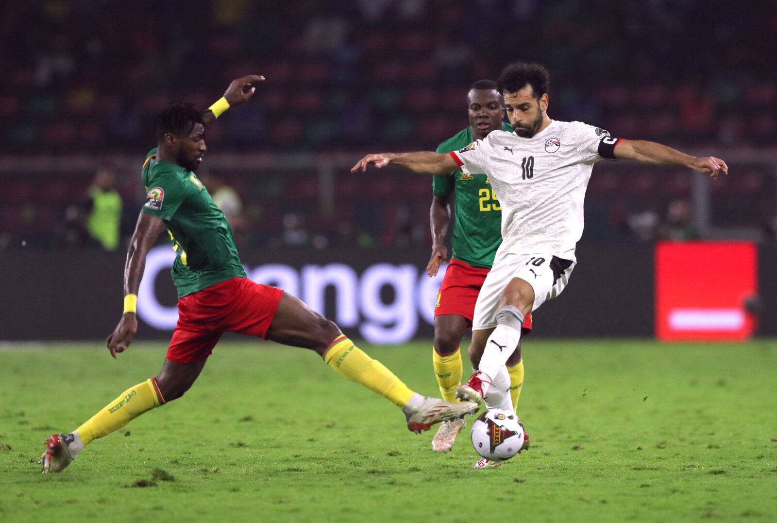 Soccer Football - Africa Cup of Nations - Semi Final - Cameroon v Egypt - Olembe Stadium, Yaounde, Cameroon - February 3, 2022  Cameroon's Andre-Frank Zambo Anguissa in action with Egypt's Mohamed Salah REUTERS/Mohamed Abd El Ghany