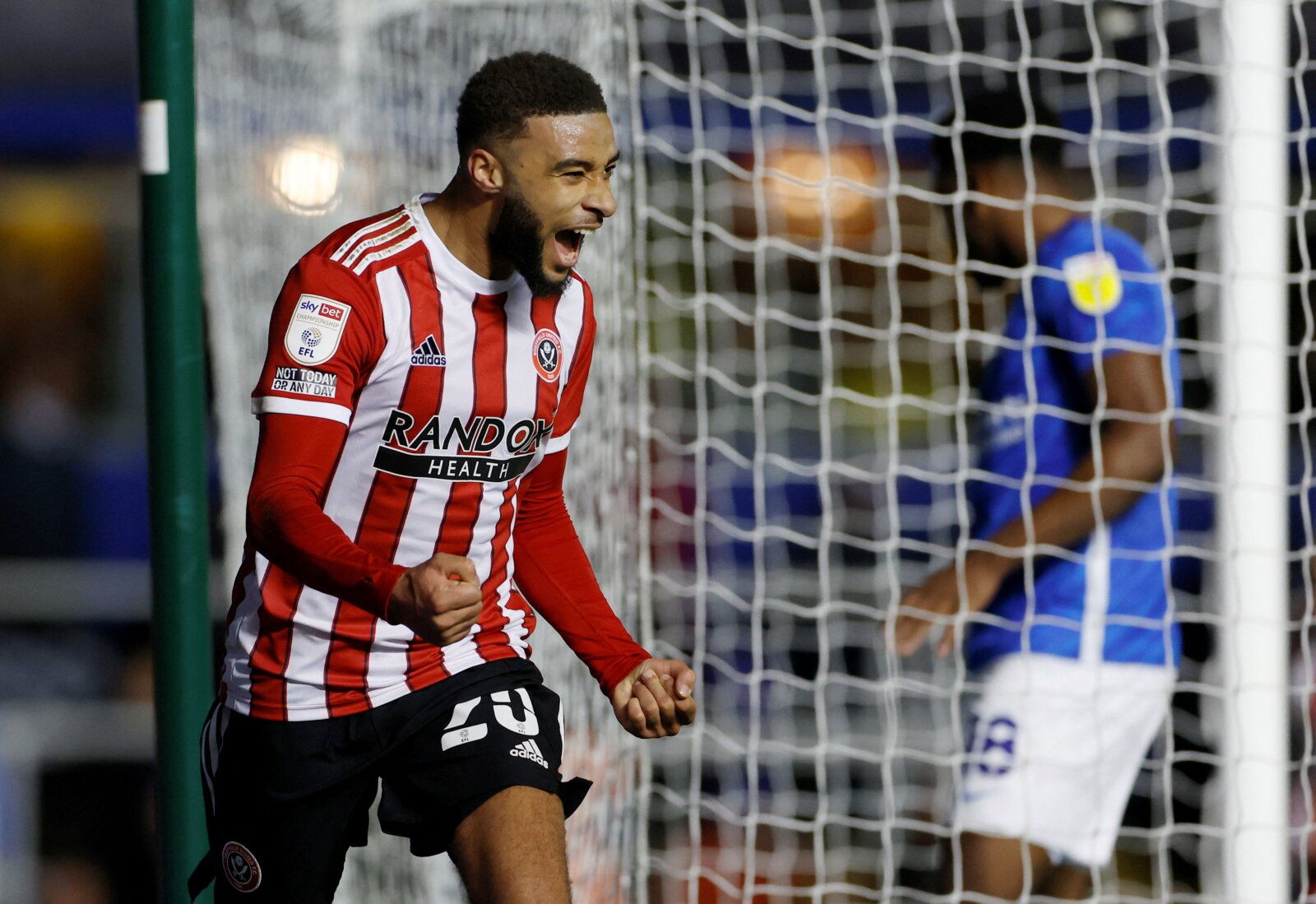 Soccer Football - Championship - Birmingham City v Sheffield United - St Andrew's, Birmingham, Britain - February 4, 2022 Sheffield United's Jayden Bogle celebrates scoring their second goal  Action Images/Jason Cairnduff  EDITORIAL USE ONLY. No use with unauthorized audio, video, data, fixture lists, club/league logos or 'live' services. Online in-match use limited to 75 images, no video emulation. No use in betting, games or single club /league/player publications. Please contact your account 
