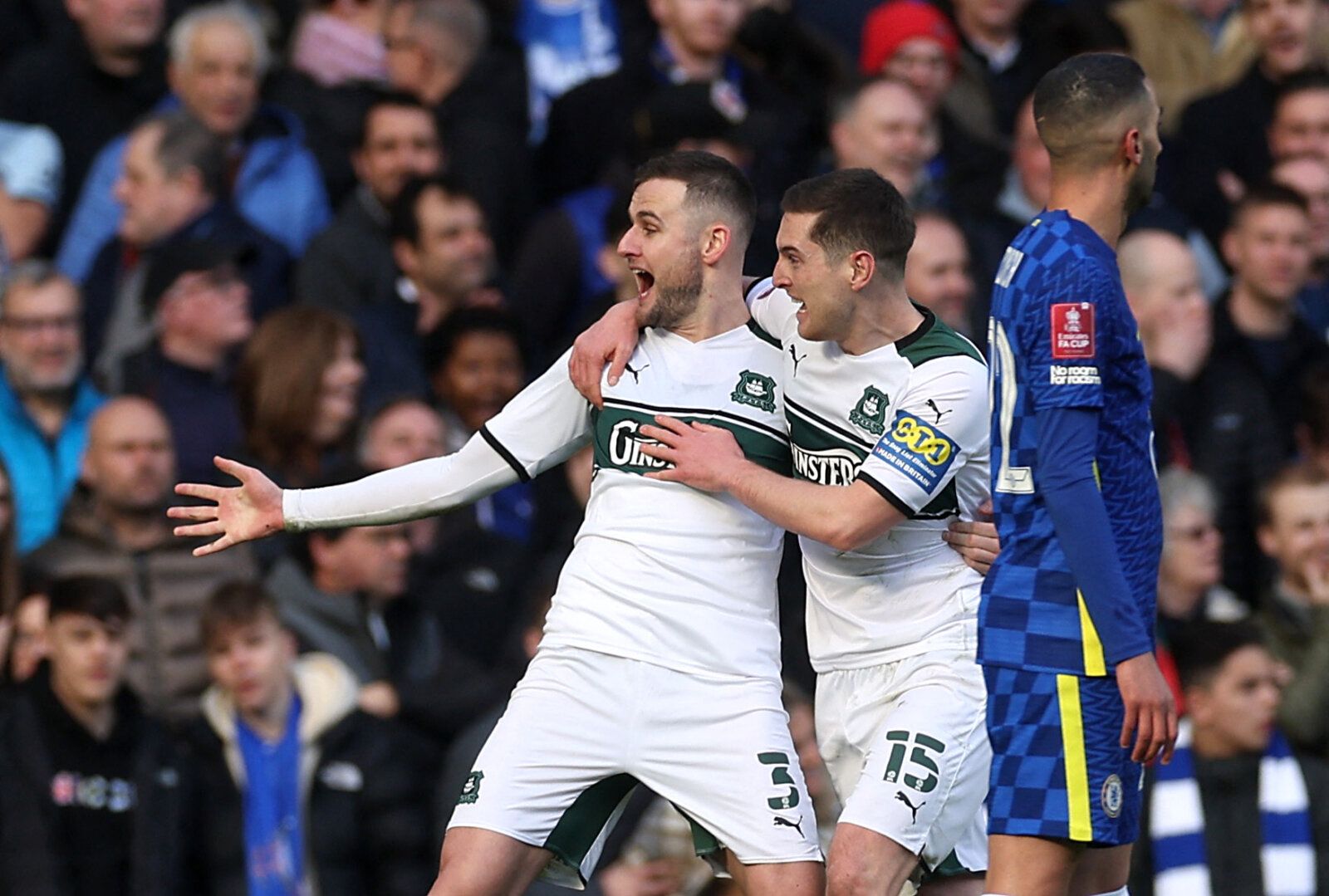 Soccer Football - FA Cup - Fourth Round - Chelsea v Plymouth Argyle - Stamford Bridge, London, Britain - February 5, 2022 Plymouth Argyle's Macaulay Gillesphey celebrates scoring their first goal with Conor Grant Action Images via Reuters/Paul Childs