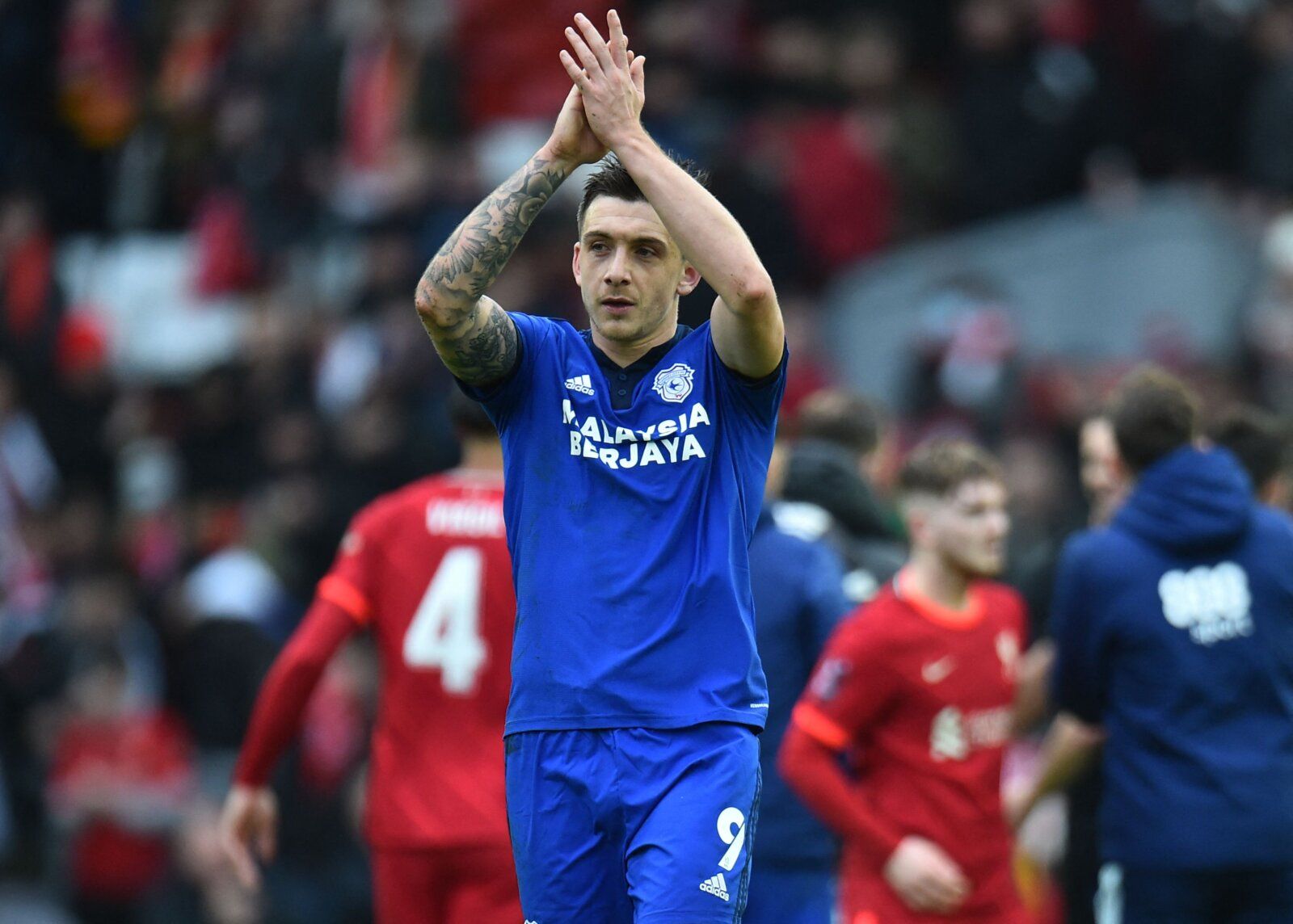 Soccer Football -  FA Cup - Fourth Round - Liverpool v Cardiff City - Anfield, Liverpool, Britain - February 6, 2022 Cardiff City's Jordan Hugill applauds fans after the match REUTERS/Peter Powell