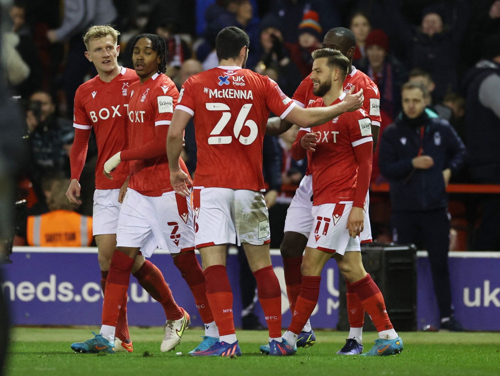 Soccer Football - FA Cup - Fourth Round - Nottingham Forest v Leicester City - The City Ground, Nottingham, Britain - February 6, 2022 Nottingham Forest's Djed Spence celebrates scoring their fourth goal with teammates Action Images via Reuters/Carl Recine