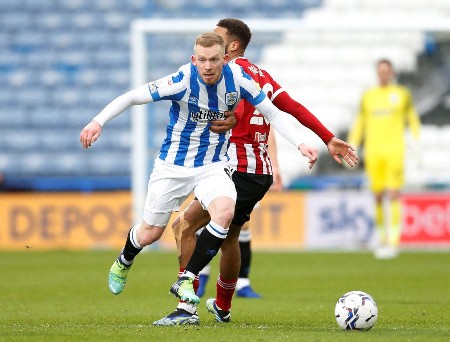 Soccer Football - Championship - Huddersfield Town v Sheffield United - John Smith's Stadium, Huddersfield, Britain - February 12, 2022 Huddersfield Town's Lewis O'Brien in action  Action Images/Ed Sykes  EDITORIAL USE ONLY. No use with unauthorized audio, video, data, fixture lists, club/league logos or 