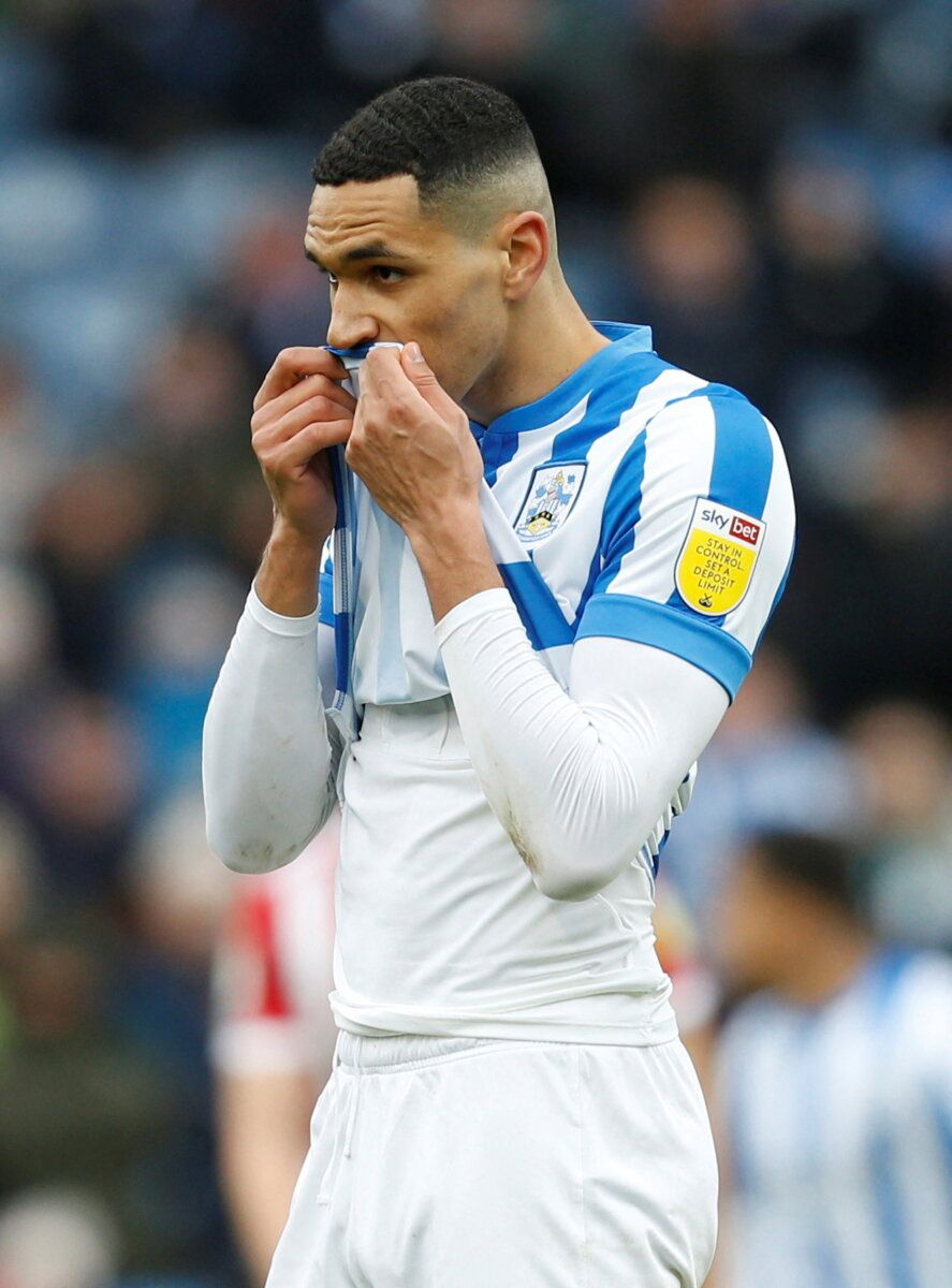 Soccer Football - Championship - Huddersfield Town v Sheffield United - John Smith's Stadium, Huddersfield, Britain - February 12, 2022 Huddersfield Town's Jon Russell reacts  Action Images/Ed Sykes  EDITORIAL USE ONLY. No use with unauthorized audio, video, data, fixture lists, club/league logos or 