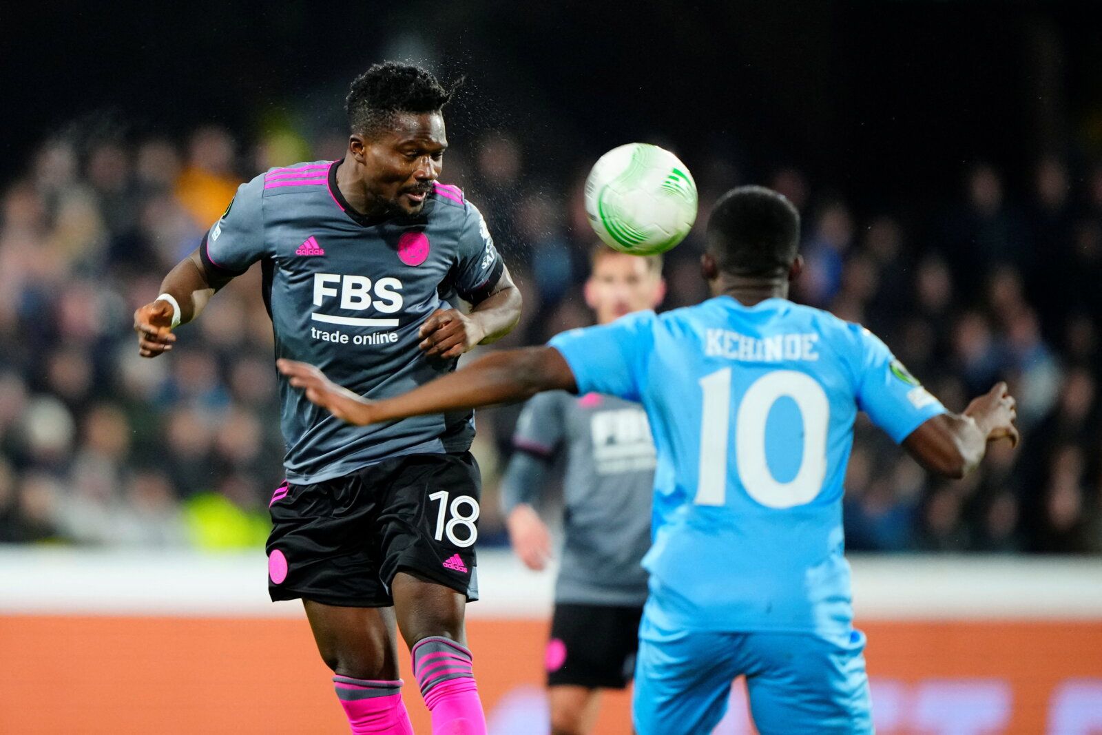 Soccer Football - Europa Conference League - Play Off Second Leg - Randers FC v Leicester City - Randers Stadium, Randers, Denmark - February 24, 2022  Randers FC's Tosin Kehinde in action with Leicester City's Daniel Amartey Bo Amstrup/Ritzau Scanpix via REUTERS ATTENTION EDITORS - THIS IMAGE WAS PROVIDED BY A THIRD PARTY. DENMARK OUT. NO COMMERCIAL OR EDITORIAL SALES IN DENMARK.