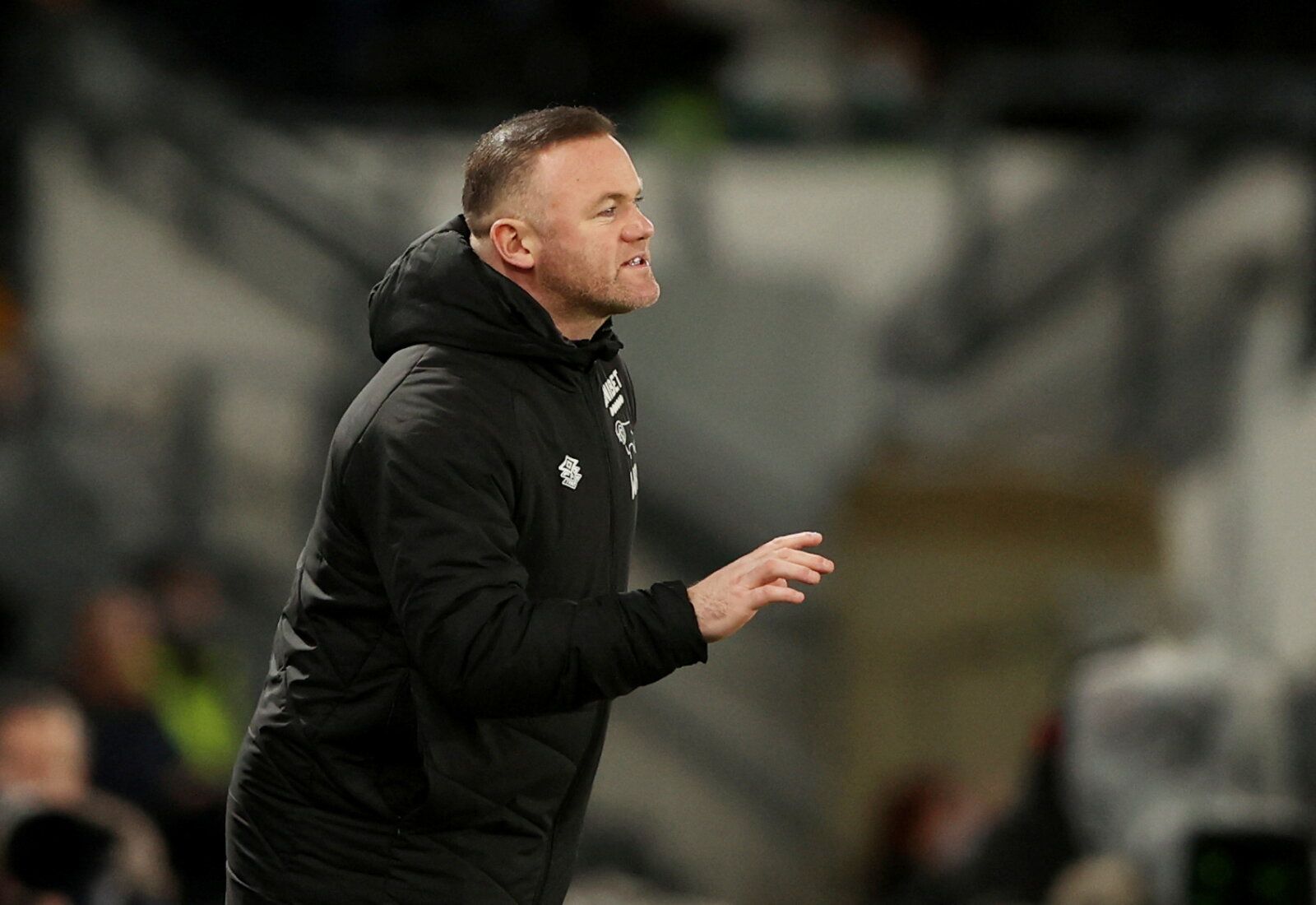 Soccer Football - Championship - Derby County v Hull City - Pride Park, Derby, Britain - February 8, 2022  Derby County manager Wayne Rooney   Action Images/Molly Darlington  EDITORIAL USE ONLY. No use with unauthorized audio, video, data, fixture lists, club/league logos or 