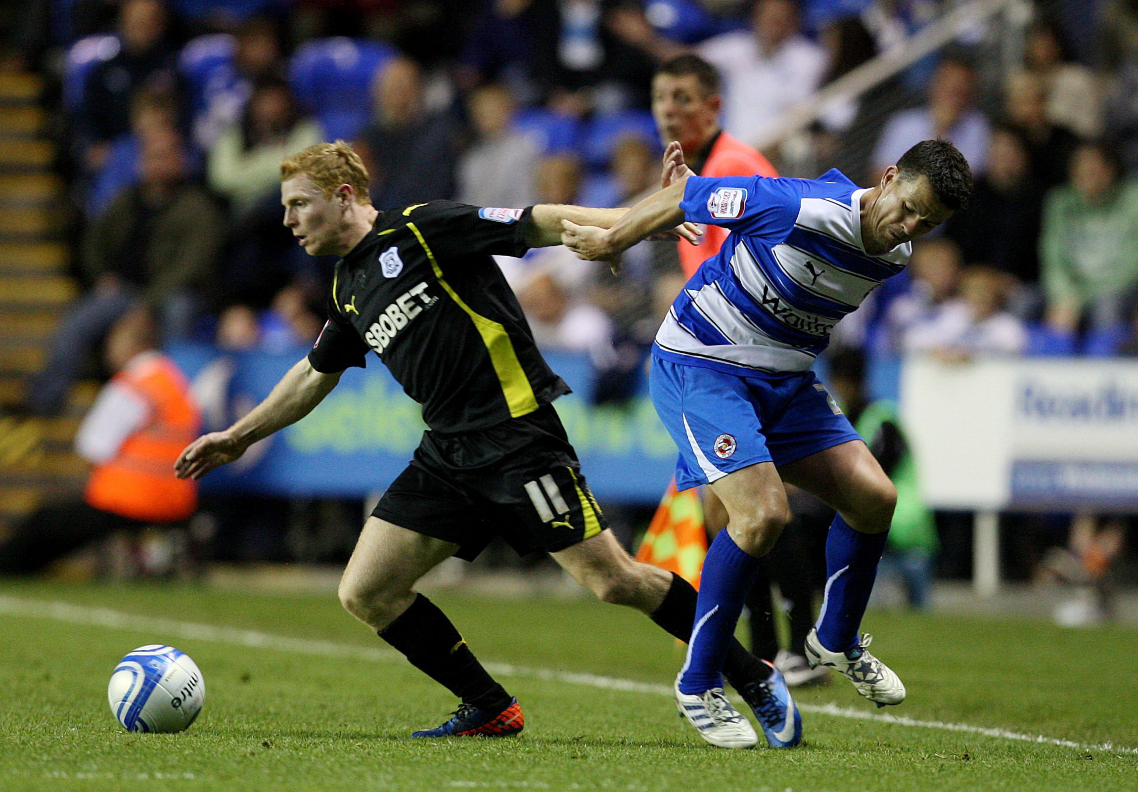 Football - Reading v Cardiff City npower Football League Championship Play-Off Semi Final First Leg  - The Madejski Stadium - 10/11 - 13/5/11 
Cardiff City's Chris Burke (L) and Reading's Grzegorz Rasiak in action 
Mandatory Credit: Action Images / Steven Paston 
Livepic