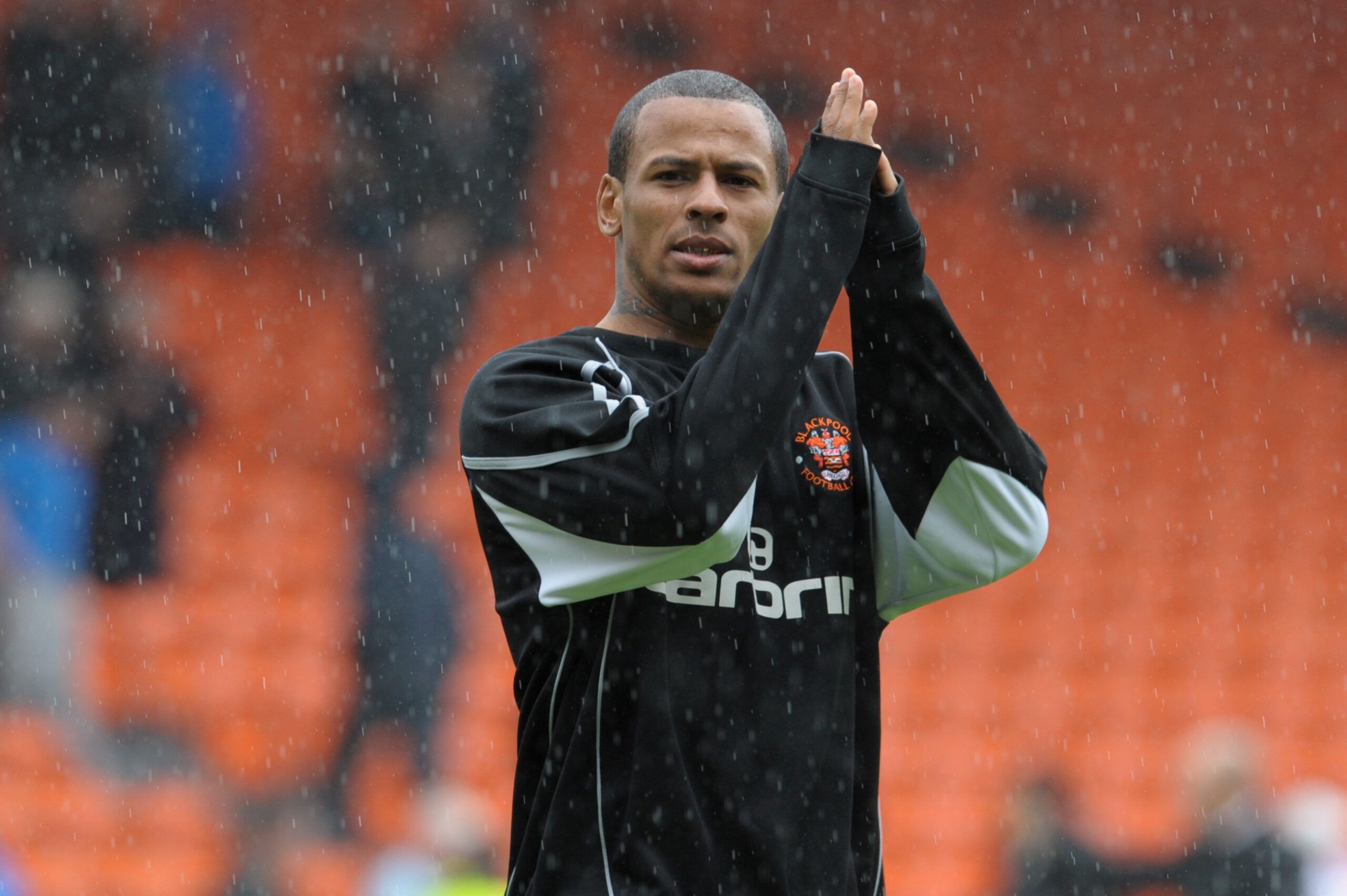 Football - Blackpool v Bolton Wanderers - Barclays Premier League - Bloomfield Road - 10/11 - 14/5/11 
DJ Campbell - Blackpool applauds fans during lap of appreciation 
Mandatory Credit: Action Images / Paul Currie 
NO ONLINE/INTERNET USE WITHOUT A LICENCE FROM THE FOOTBALL DATA CO LTD. FOR LICENCE ENQUIRIES PLEASE TELEPHONE +44 (0) 207 864 9000.