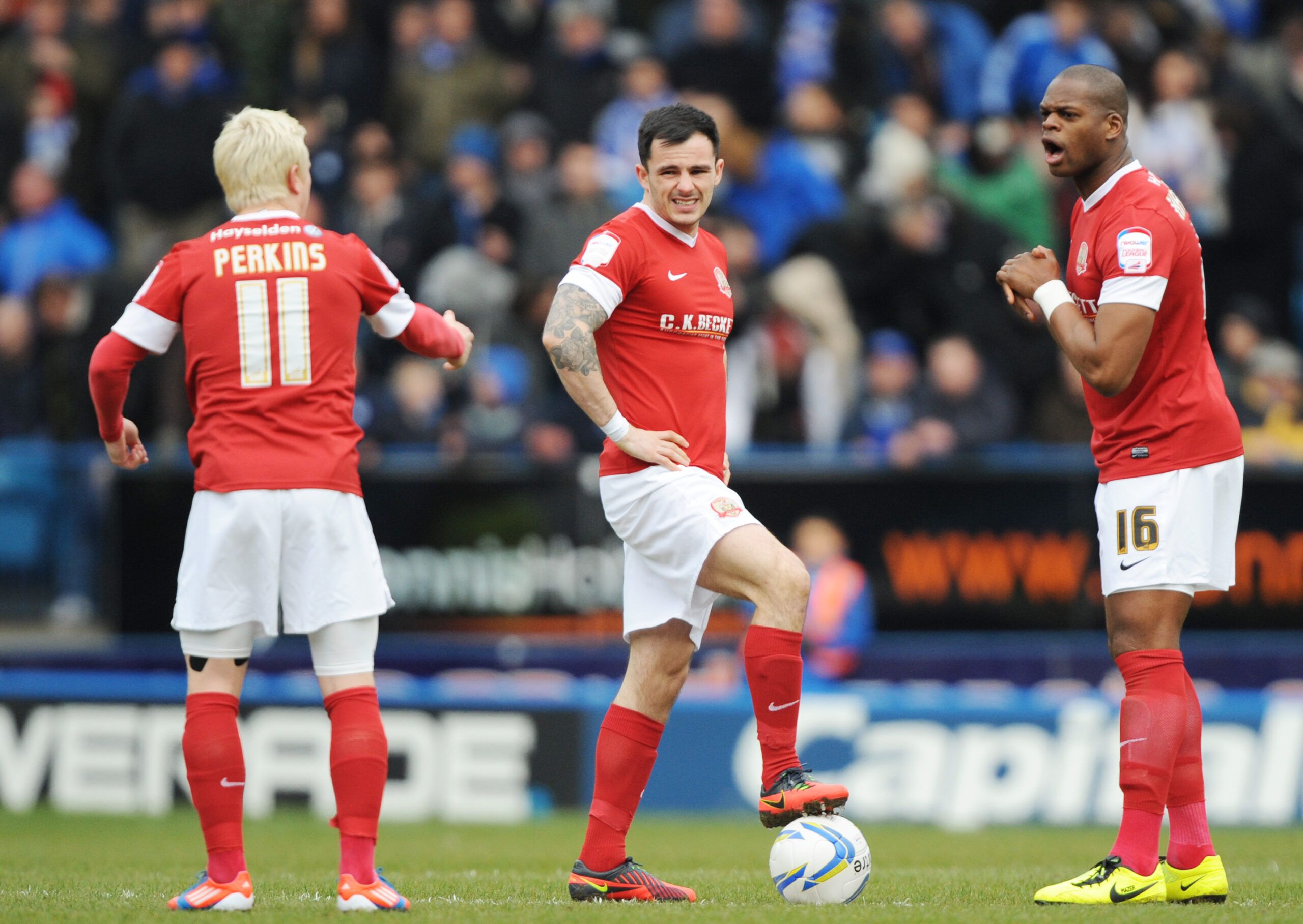 Football - Sheffield Wednesday v Barnsley - npower Football League Championship - Hillsborough - 12/13 - 30/3/13 
(L-R) Barnsley's David Perkins, Chris Dagnall and Marlon Harewood prepare to kick off 
Mandatory Credit: Action Images / John Rushworth 
EDITORIAL USE ONLY. No use with unauthorized audio, video, data, fixture lists, club/league logos or live services. Online in-match use limited to 45 images, no video emulation. No usex in betting, games or single club/league/player publications.  P