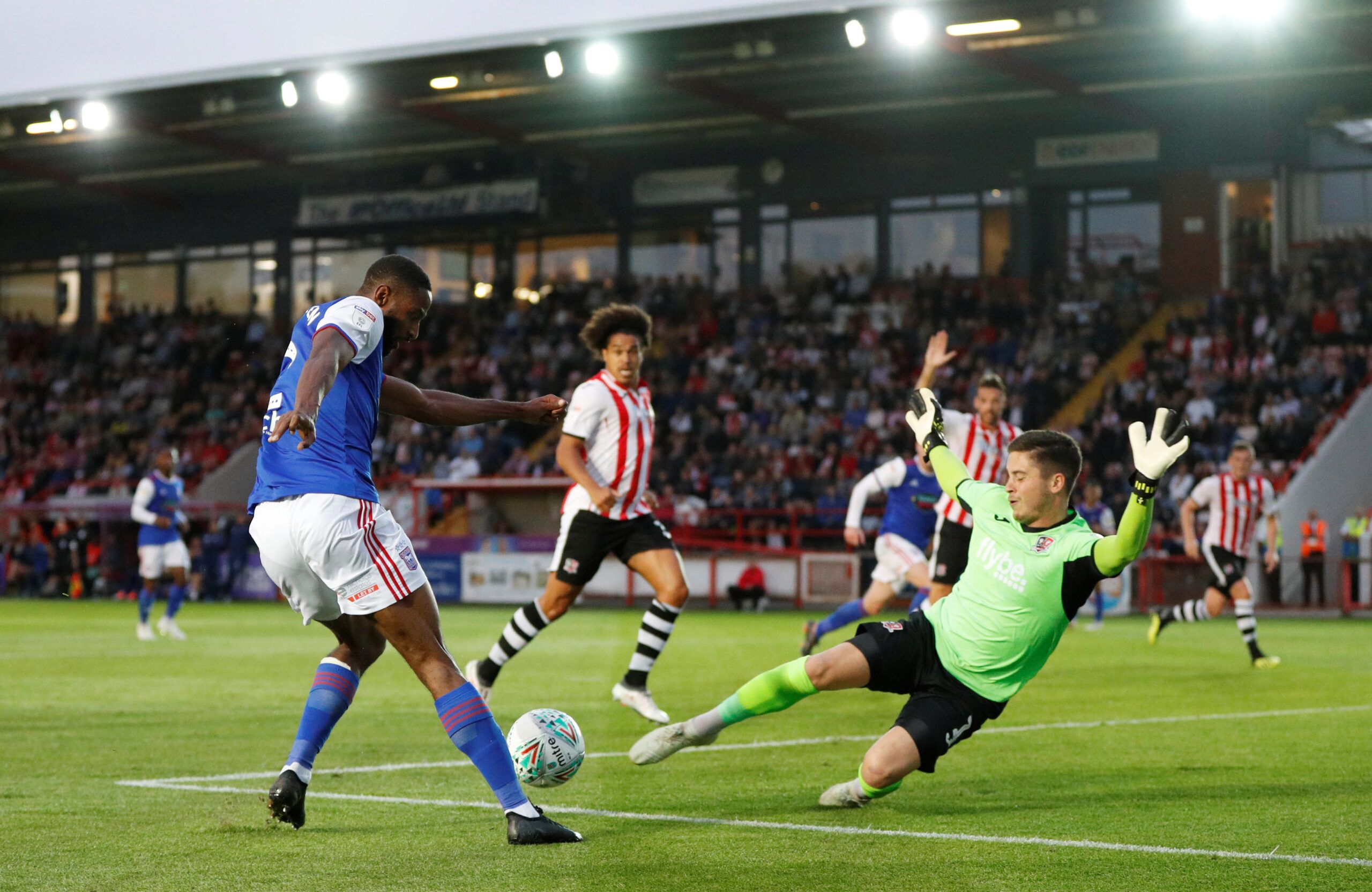 Soccer Football - Carabao Cup First Round - Exeter City v Ipswich Town - St James Park, Exeter, Britain - August 14, 2018  Ipswich Town’s Janoi Donacien in action with Exeter City’s Christy Pym  Action Images/John Sibley  EDITORIAL USE ONLY. No use with unauthorized audio, video, data, fixture lists, club/league logos or 
