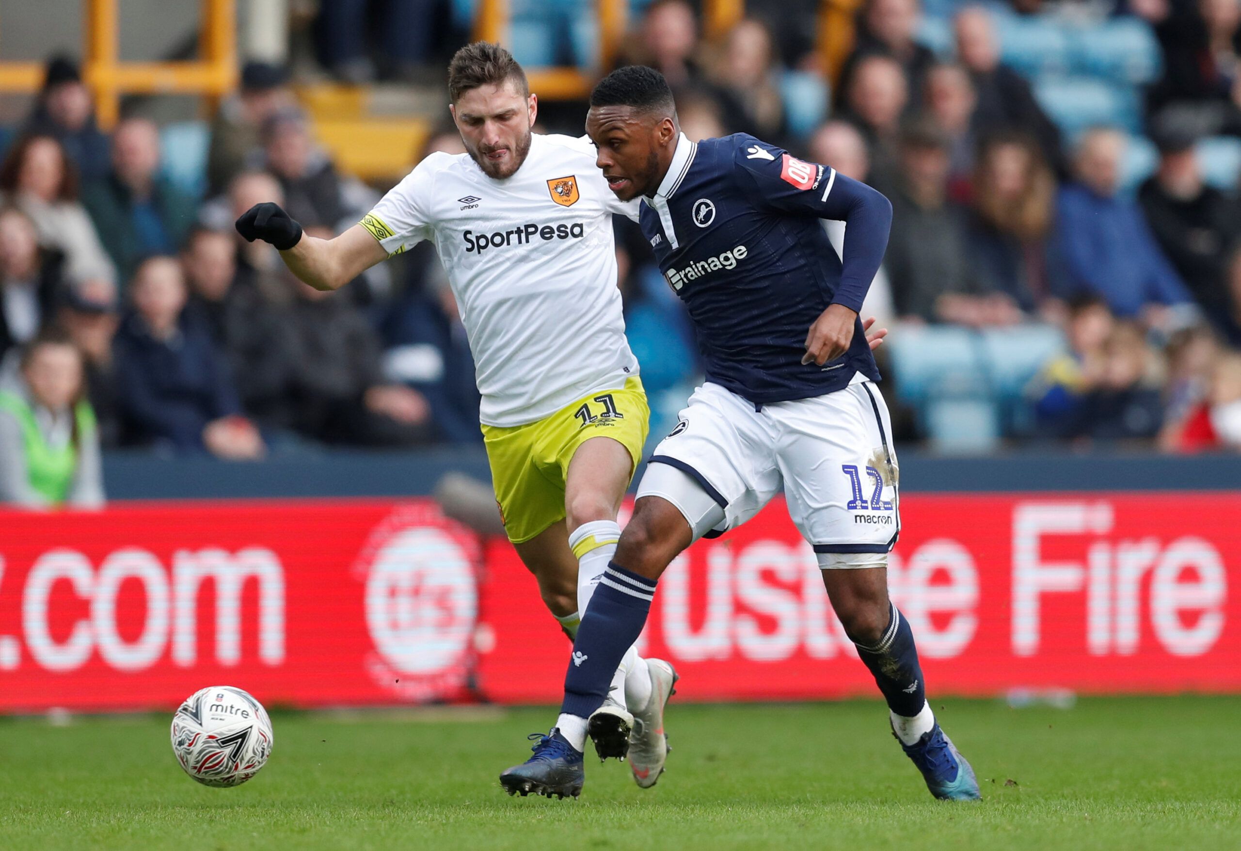Soccer Football - FA Cup Third Round - Millwall v Hull City - The Den, London, Britain - January 6, 2019   Mahlon Romeo of Millwall in action with David Milinkovic of Hull City    Action Images/Matthew Childs