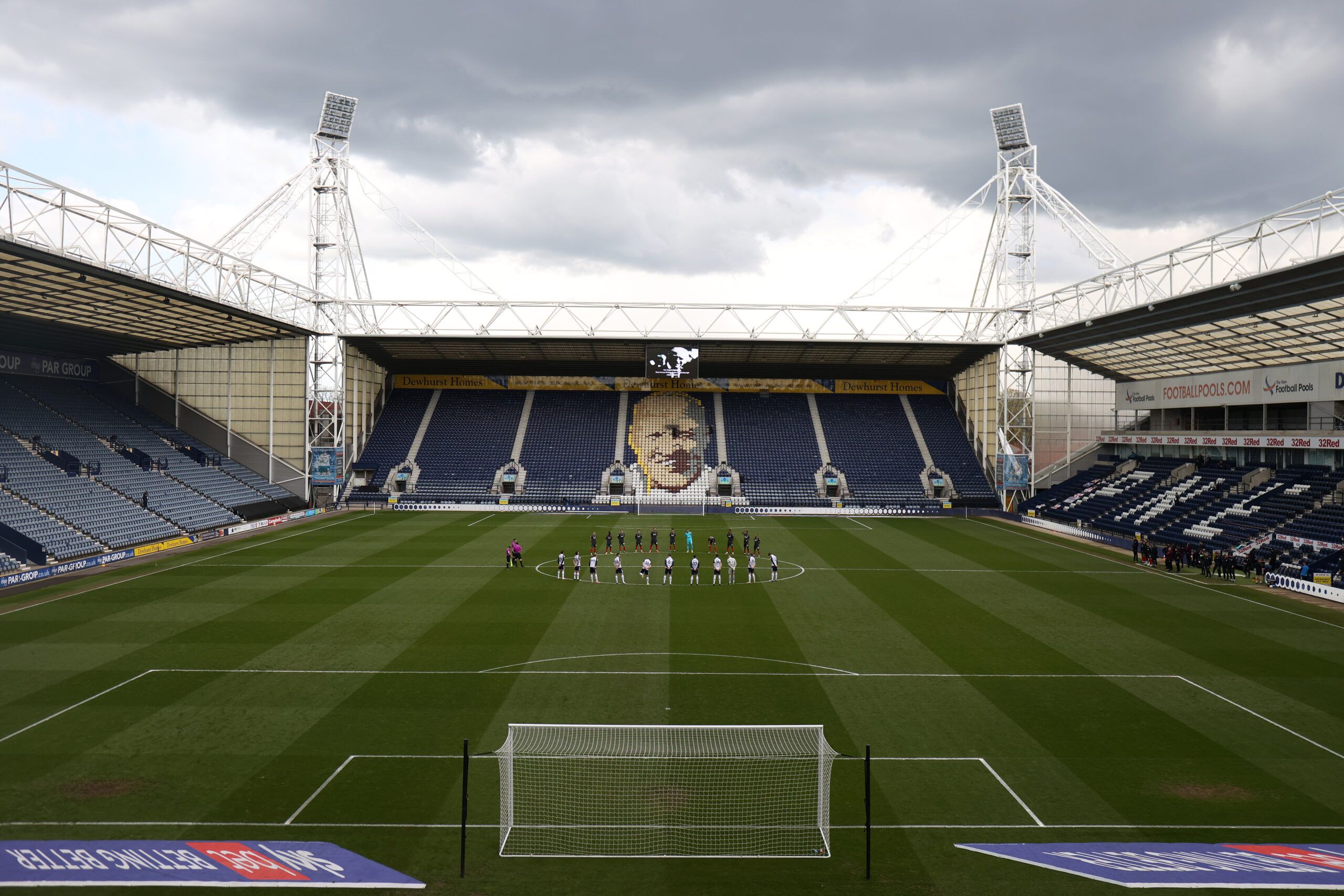 Soccer Football - Championship - Preston North End v Brentford - Deepdale, Preston, Britain - April 10, 2021 General view of the players during a two minute silence after Britain's Prince Philip, husband of Queen Elizabeth, died at the age of 99 Action Images via Reuters/Molly Darlington EDITORIAL USE ONLY. No use with unauthorized audio, video, data, fixture lists, club/league logos or 'live' services. Online in-match use limited to 75 images, no video emulation. No use in betting, games or sin