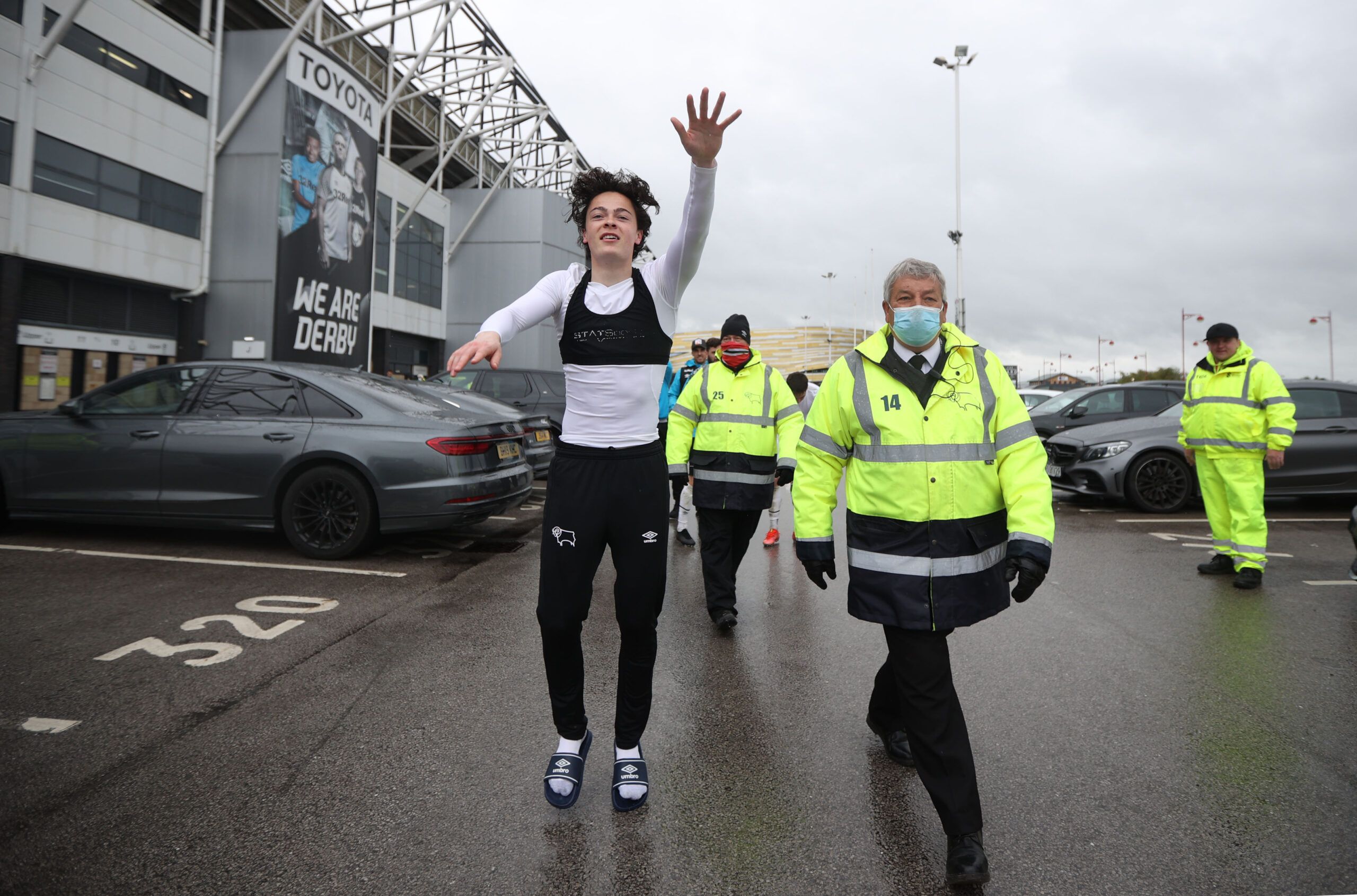 Soccer Football - Championship - Derby County v Sheffield Wednesday - Pride Park, Derby, Britain - May 8, 2021 Derby County's Louie Watson celebrates outside the stadium after avoiding relegation Action Images/Molly Darlington EDITORIAL USE ONLY. No use with unauthorized audio, video, data, fixture lists, club/league logos or 'live' services. Online in-match use limited to 75 images, no video emulation. No use in betting, games or single club /league/player publications.  Please contact your acc