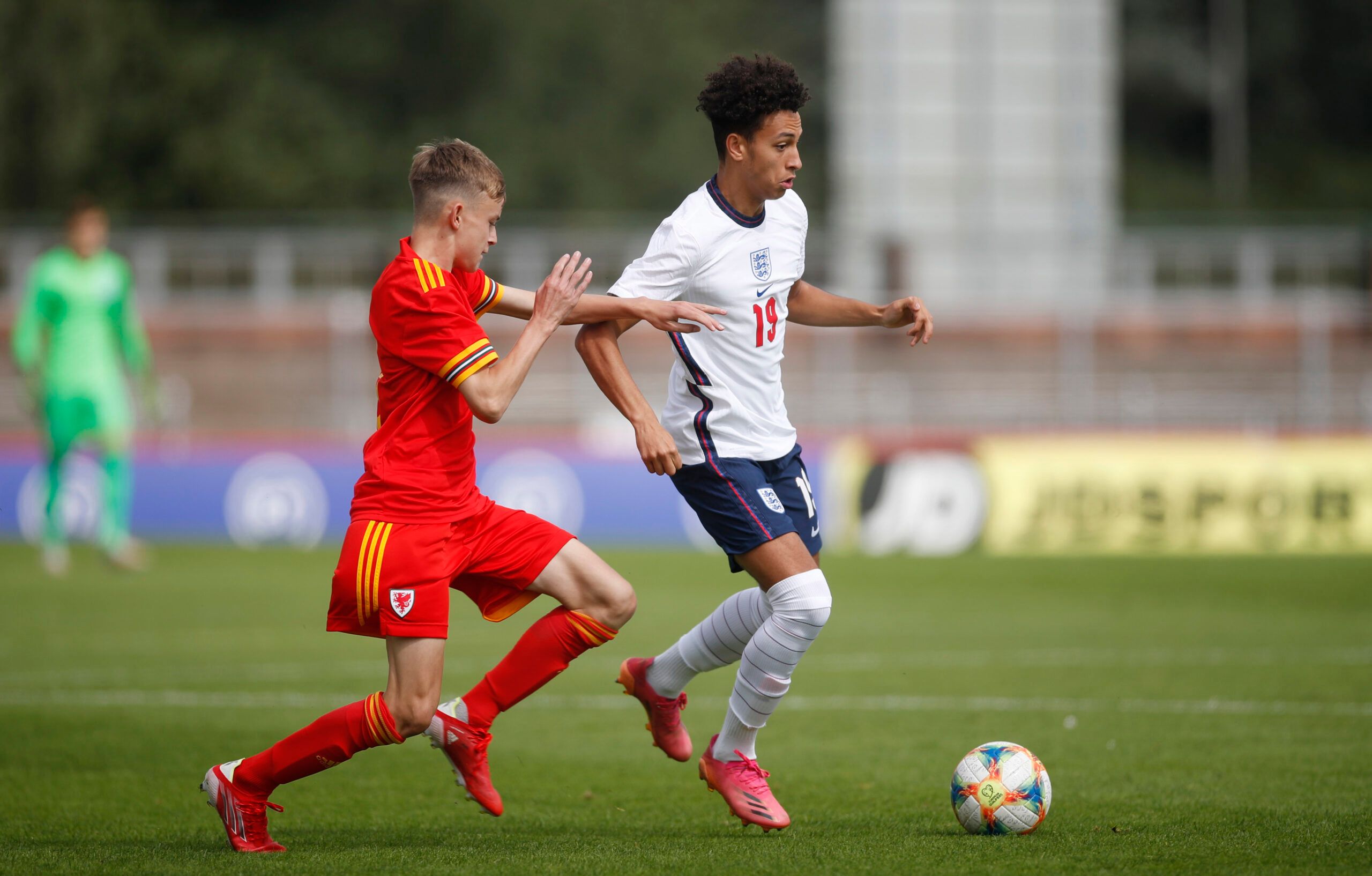 Soccer Football - Under 18 International Friendly - Wales v England - Spytty Park, Newport, Wales Britain - September 3, 2021 Wales' Joel Green in action with England's Kaide Gordon Action Images/Matthew Childs