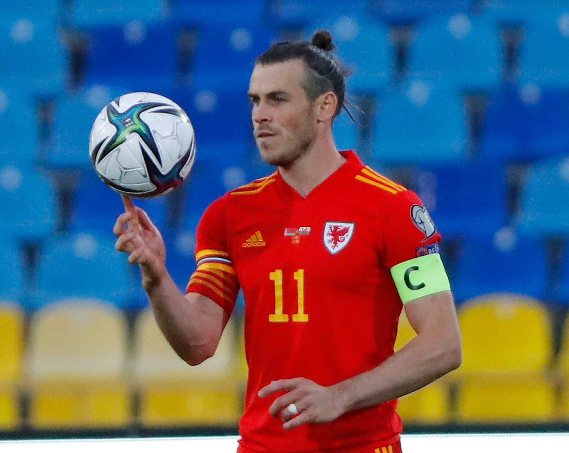 Soccer Football - World Cup - UEFA Qualifiers - Group E - Belarus v Wales - Central Stadium, Kazan, Russia - September 5, 2021 Wales' Gareth Bale holds the match ball after scoring their third goal to complete his hat-trick REUTERS/Evgenia Novozhenina