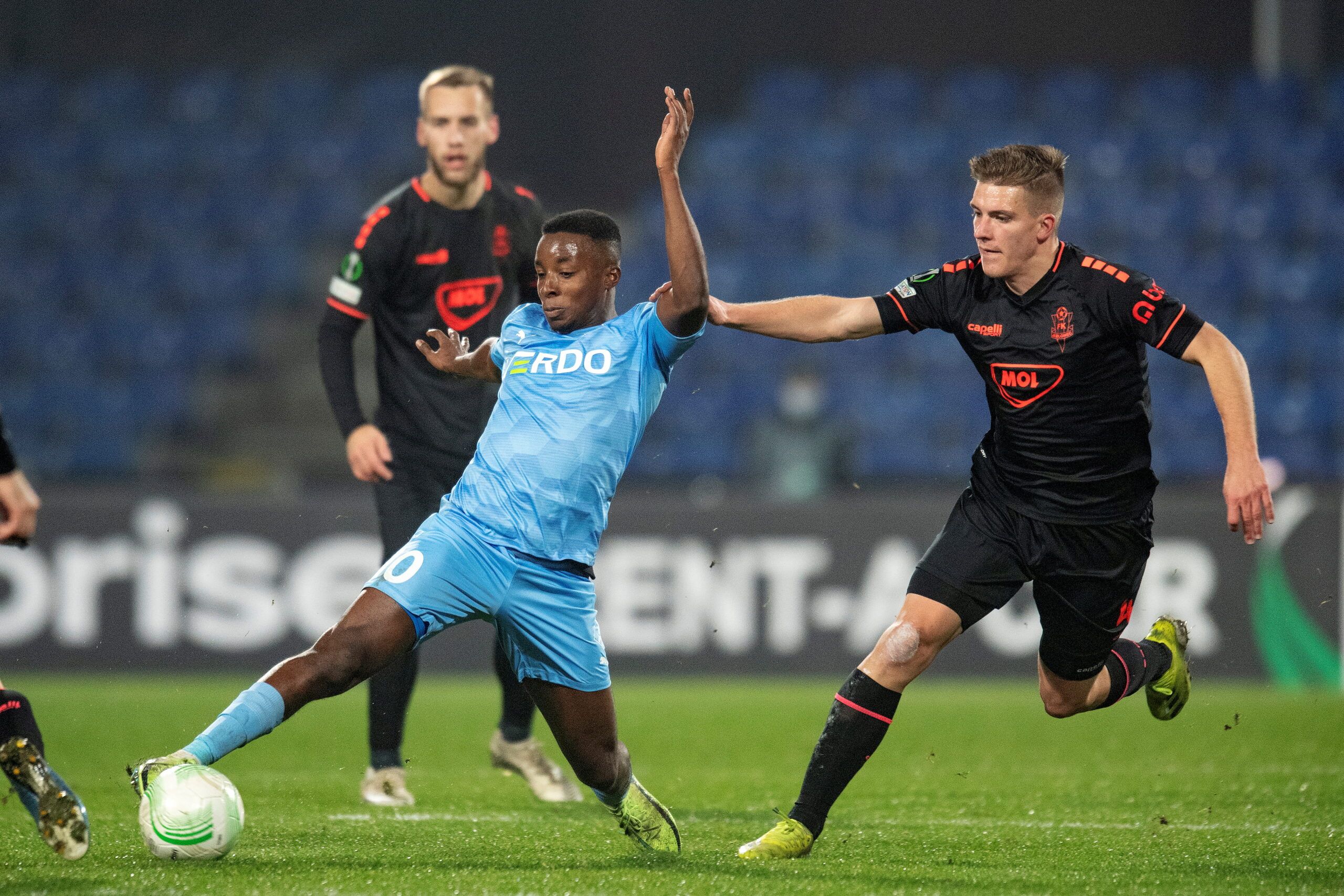 Soccer Football - Europa Conference League - Group D - Randers v Jablonec - Randers Stadium, Randers, Denmark - November 4, 2021 Randers Tosin Kehinde in action with Jablonec's Libor Holik Bo Amstrup/Ritzau Scanpix via REUTERS      ATTENTION EDITORS - THIS IMAGE WAS PROVIDED BY A THIRD PARTY. DENMARK OUT. NO COMMERCIAL OR EDITORIAL SALES IN DENMARK.