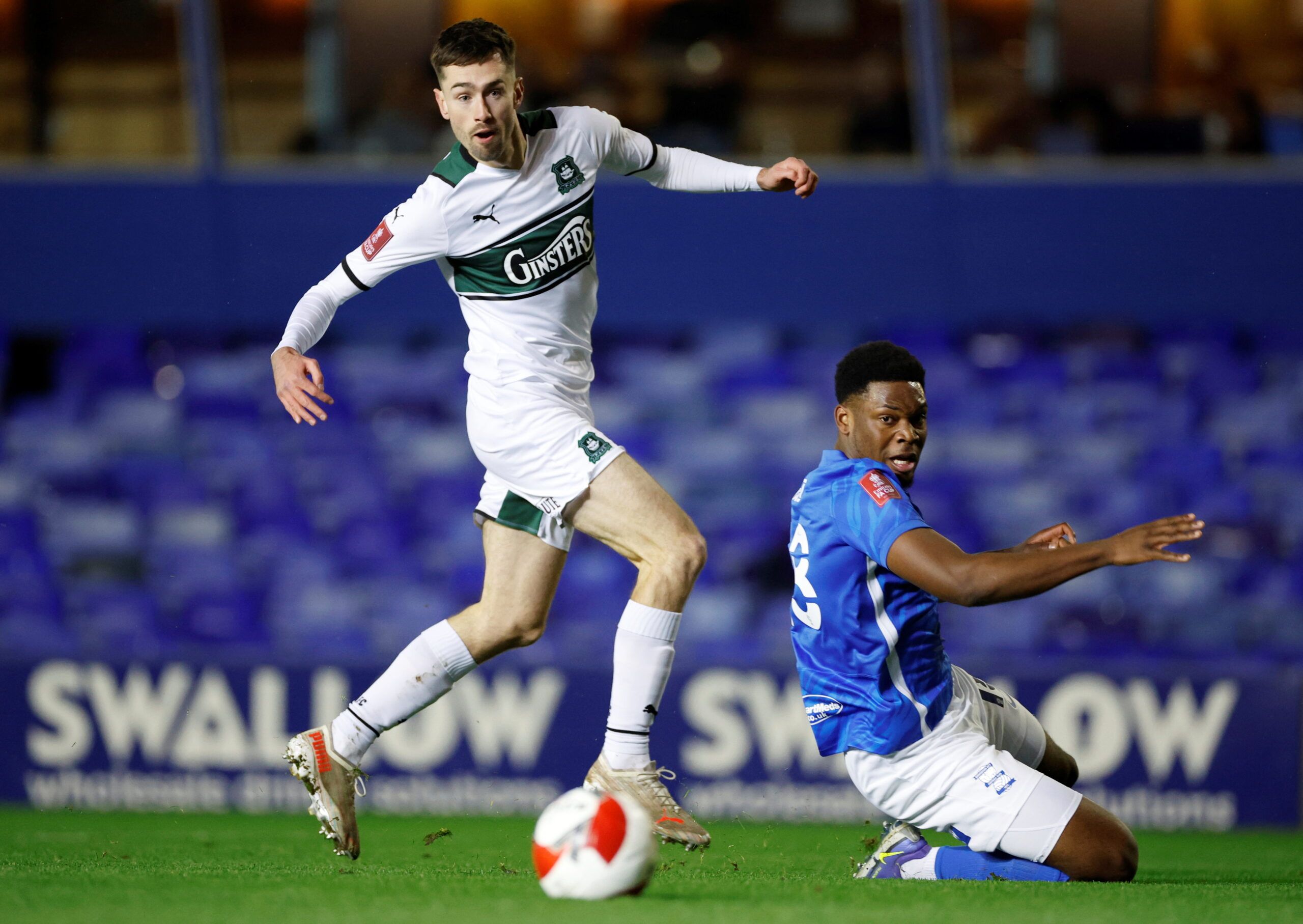 Soccer Football - FA Cup Third Round - Birmingham City v Plymouth Argyle - St Andrew's, Birmingham, Britain - January 8, 2022 Plymouth Argyle's Ryan Hardie in action with Birmingham City's Teden Mengi    Action Images/John Sibley