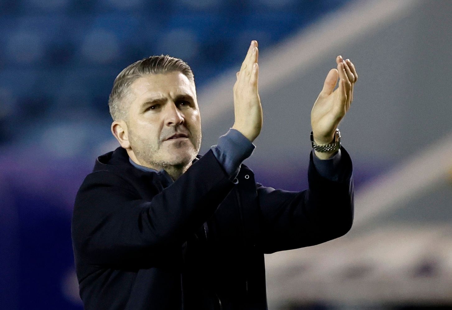 Soccer Football - Championship - Millwall v Preston North End - The Den, London, Britain - February 1, 2022 Preston North End manager Ryan Lowe applauds fans after the match Action Images/Peter Cziborra EDITORIAL USE ONLY. No use with unauthorized audio, video, data, fixture lists, club/league logos or 'live' services. Online in-match use limited to 75 images, no video emulation. No use in betting, games or single club /league/player publications.  Please contact your account representative for 