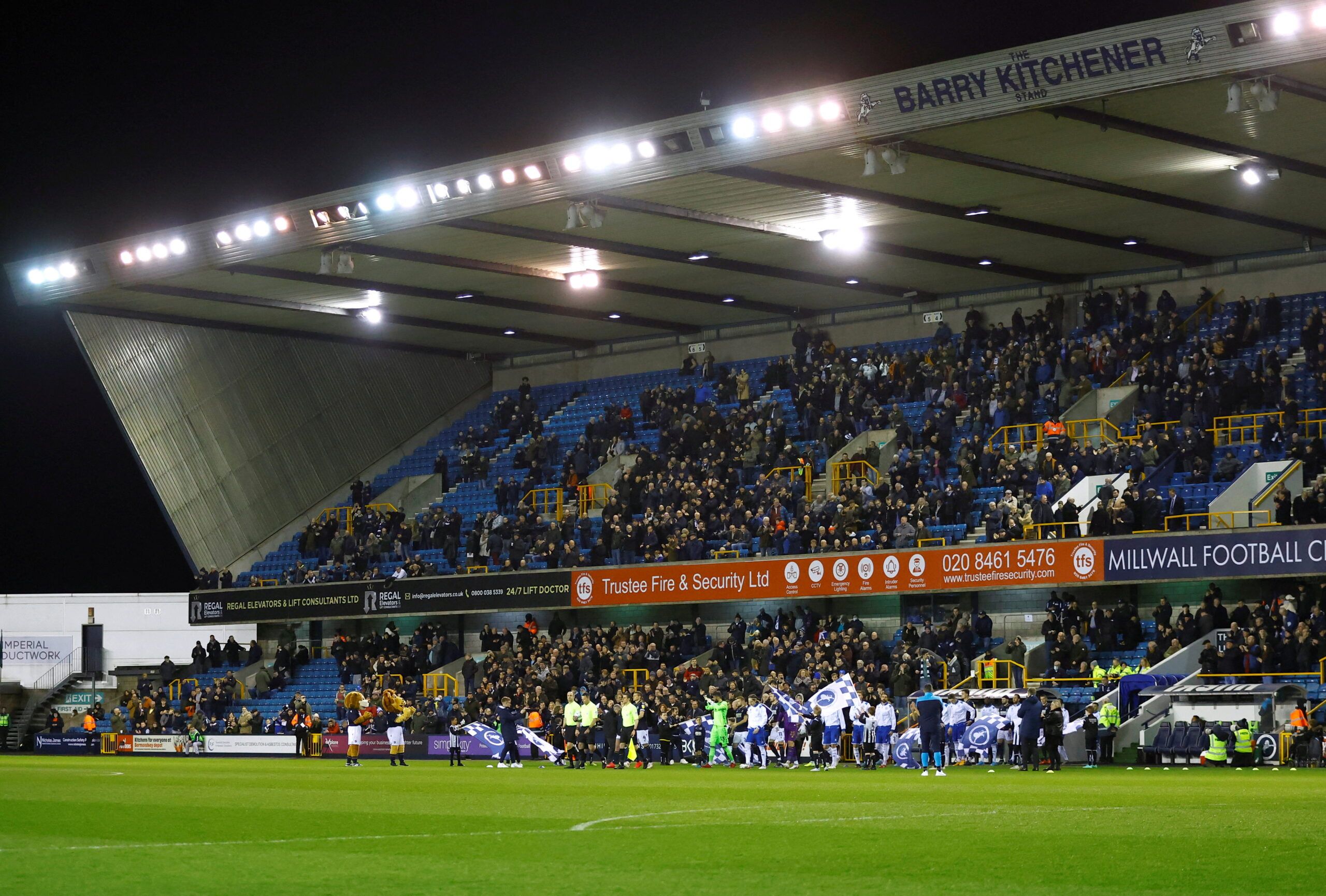 Soccer Football - Championship - Millwall v Queens Park Rangers - The Den, London, Britain - February 15, 2022 General view as the teams walk out before the match Action Images/Andrew Boyers EDITORIAL USE ONLY. No use with unauthorized audio, video, data, fixture lists, club/league logos or
