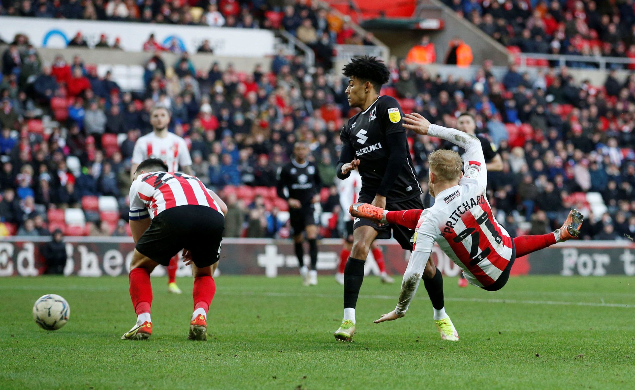 Soccer Football - Sunderland v Milton Keynes Dons - Stadium of Light, Sunderland, Britain - February 19, 2022 Sunderland's Alex Pritchard shoots at goal  Action Images/Ed Sykes??EDITORIAL USE ONLY. No use with unauthorized audio, video, data, fixture lists, club/league logos or 