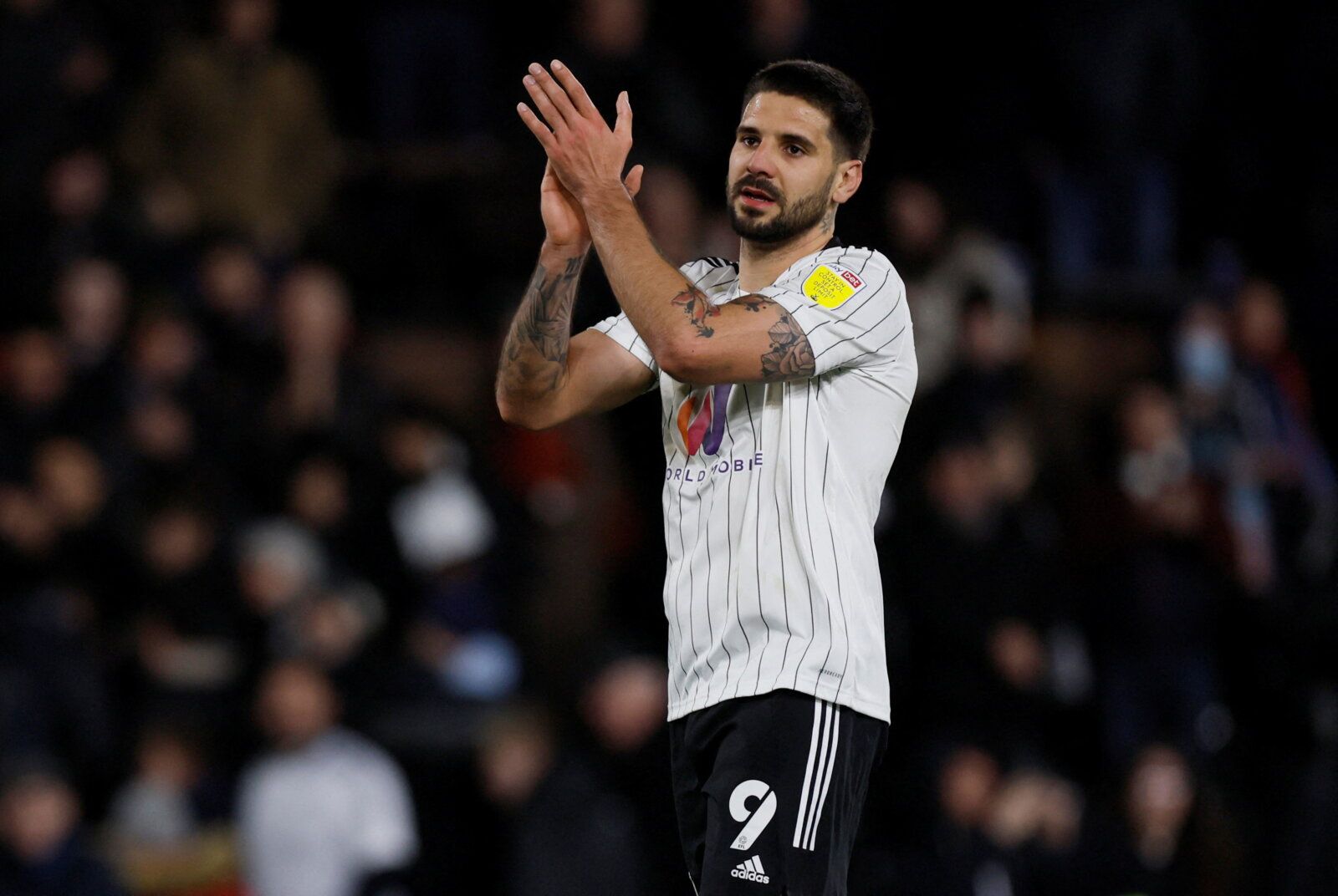 Soccer Football - Championship - Fulham v Peterborough United - Craven Cottage, London, Britain - February 23, 2022  Fulham?s Aleksandar Mitrovic applauds fans after the match Action Images/Andrew Couldridge
