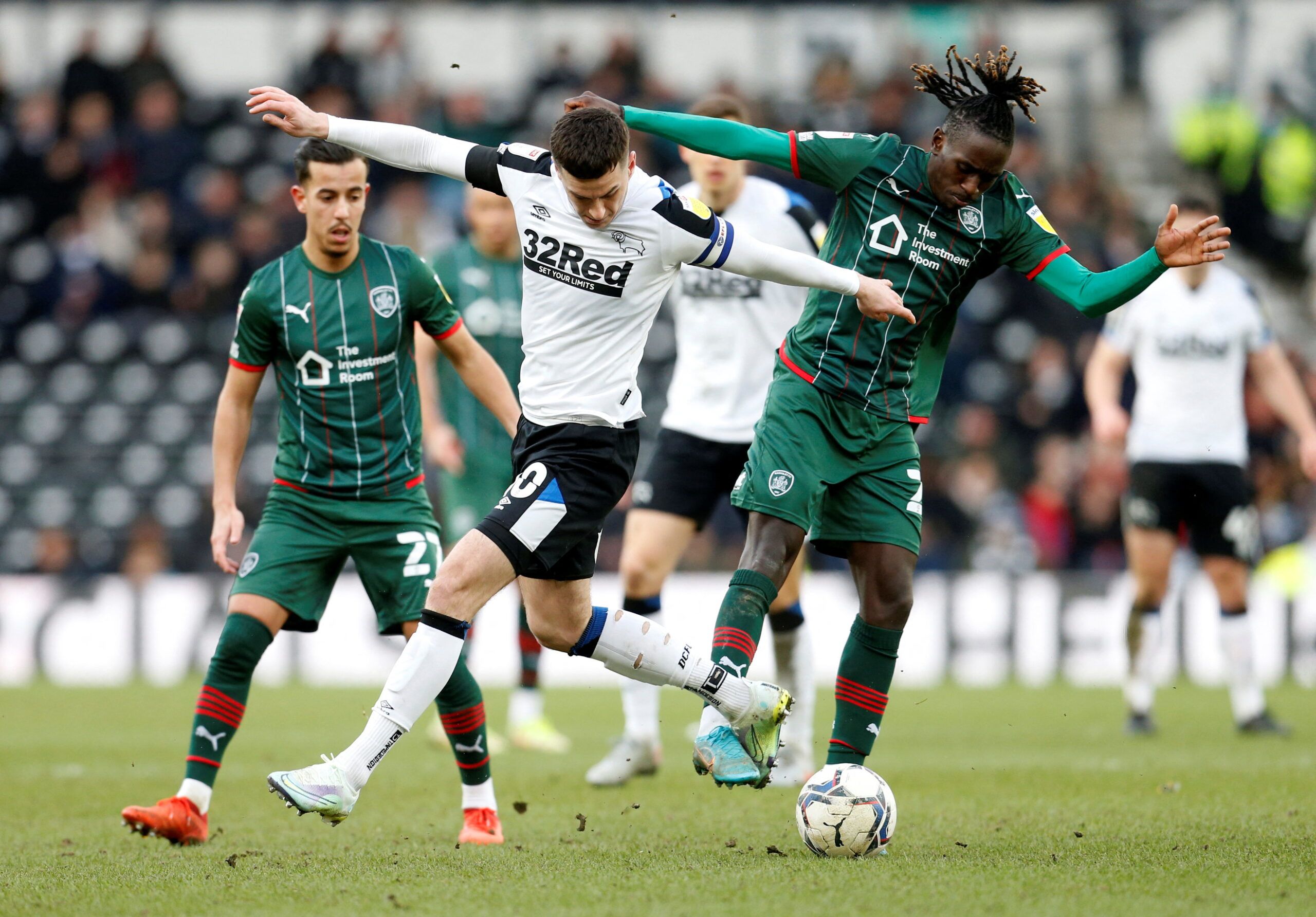 Soccer Football - Championship - Derby County v Barnsley - Pride Park, Derby, Britain - March 5, 2022  Derby County's Tom Lawrence and Barnsley's Domingos Quina in action  Action Images/Ed Sykes  EDITORIAL USE ONLY. No use with unauthorized audio, video, data, fixture lists, club/league logos or 