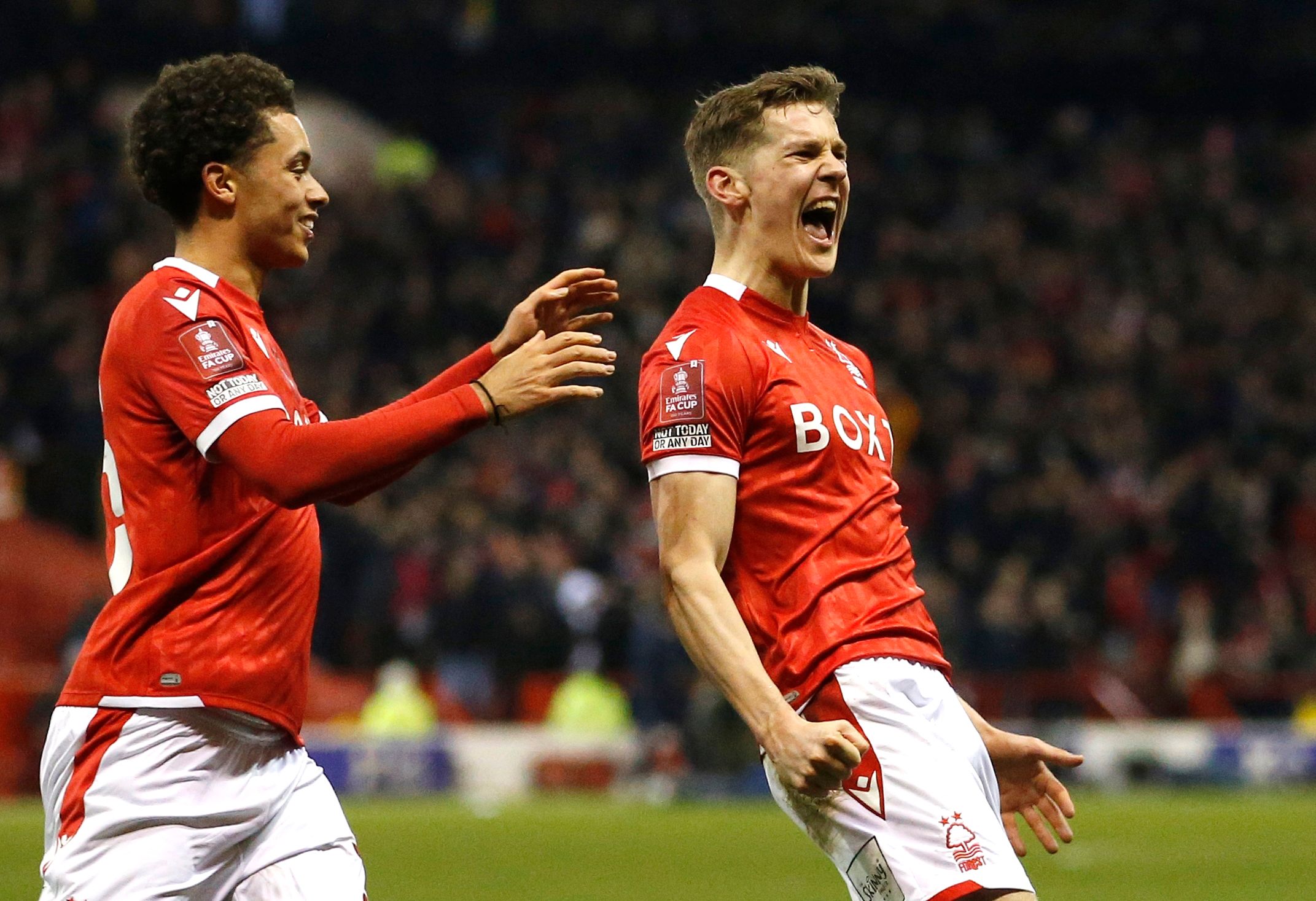 Soccer Football - FA Cup Fifth Round - Nottingham Forest v Huddersfield Town - The City Ground, Nottingham, Britain - March 7, 2022 Nottingham Forest's Ryan Yates celebrates scoring their second goal with Brennan Johnson REUTERS/Craig Brough