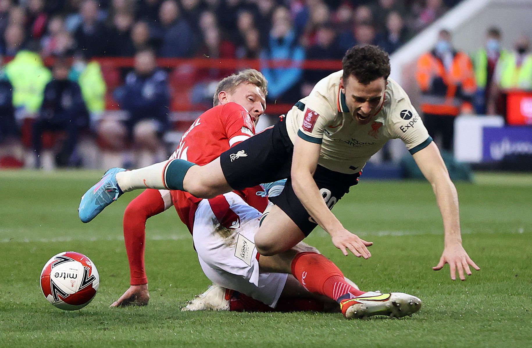 Soccer Football - FA Cup Quarter Final - Nottingham Forest v Liverpool - The City Ground, Nottingham, Britain - March 20, 2022 Nottingham Forest's Joe Worrall in action with Liverpool's Diogo Jota Action Images via Reuters/Molly Darlington