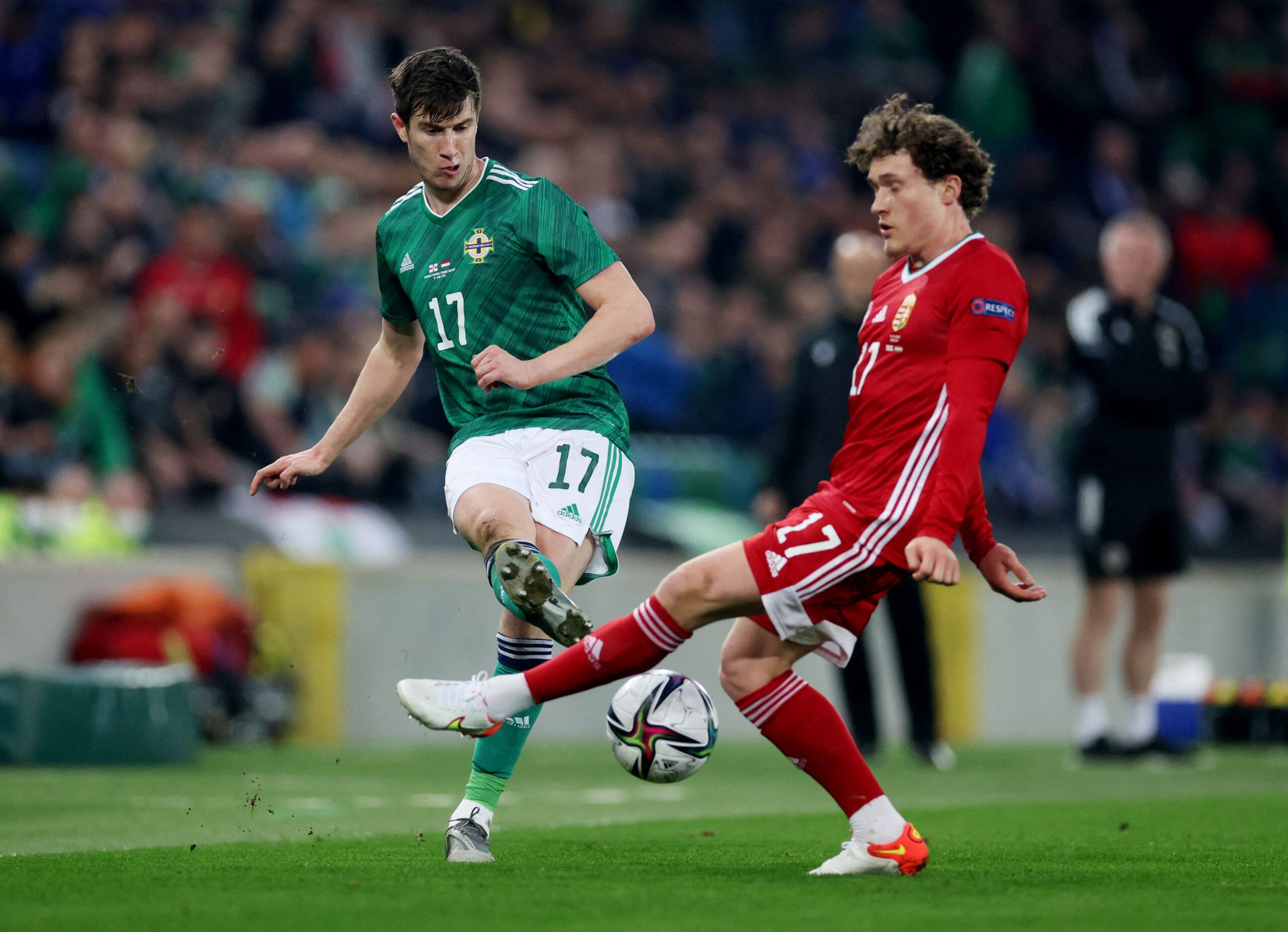 Soccer Football - International Friendly - Northern Ireland v Hungary - Windsor Park, Belfast, Northern Ireland - March 29, 2022 Northern Ireland's Paddy McNair in action with Hungary's Callum Styles Action Images via Reuters/Paul Childs