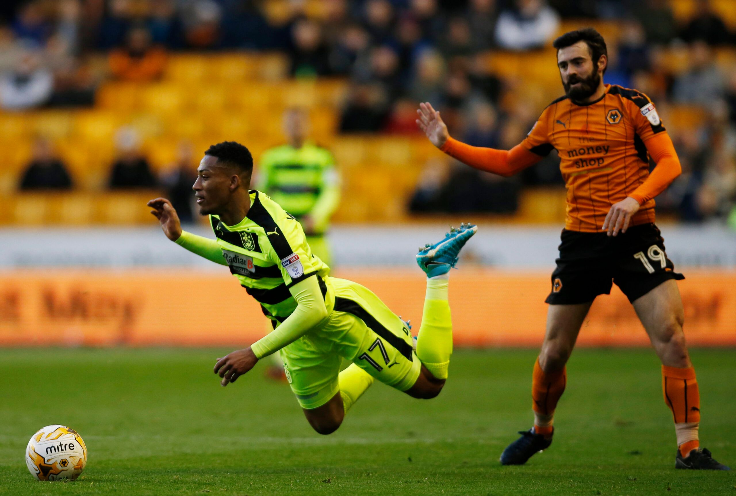 Britain Football Soccer - Wolverhampton Wanderers v Huddersfield Town - Sky Bet Championship - Molineux - 25/4/17 Wolves' Jack Price fouls Huddersfield's Rajiv van La Parra  Mandatory Credit: Action Images / Paul Childs Livepic EDITORIAL USE ONLY. No use with unauthorized audio, video, data, fixture lists, club/league logos or 