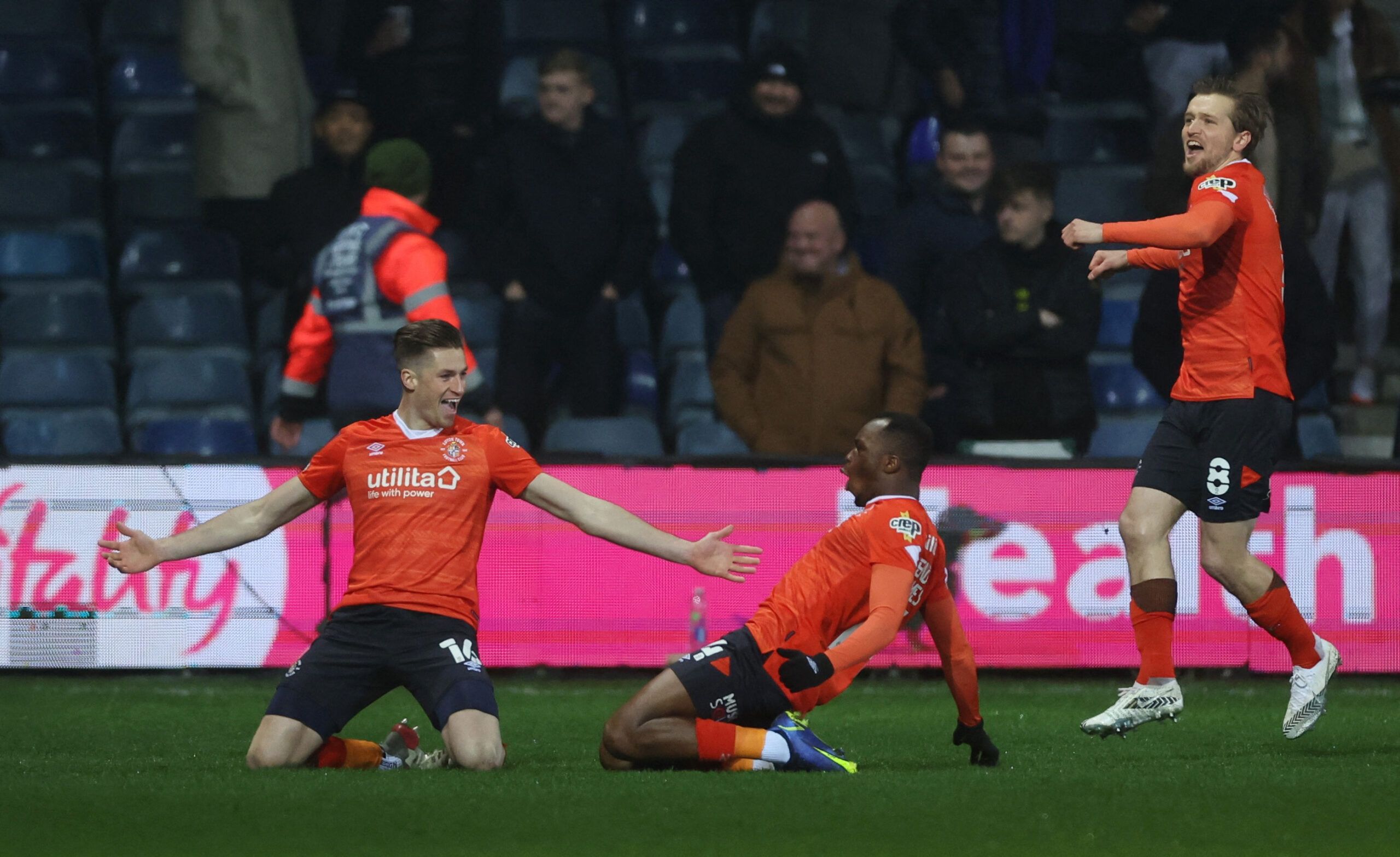 Soccer Football - FA Cup Fifth Round - Luton Town v Chelsea - Kenilworth Road, Luton, Britain - March 2, 2022 Luton Town's Reece Burke celebrates scoring their first goal with Carlos Mendes Gomes and Luke Berry REUTERS/Matthew Childs