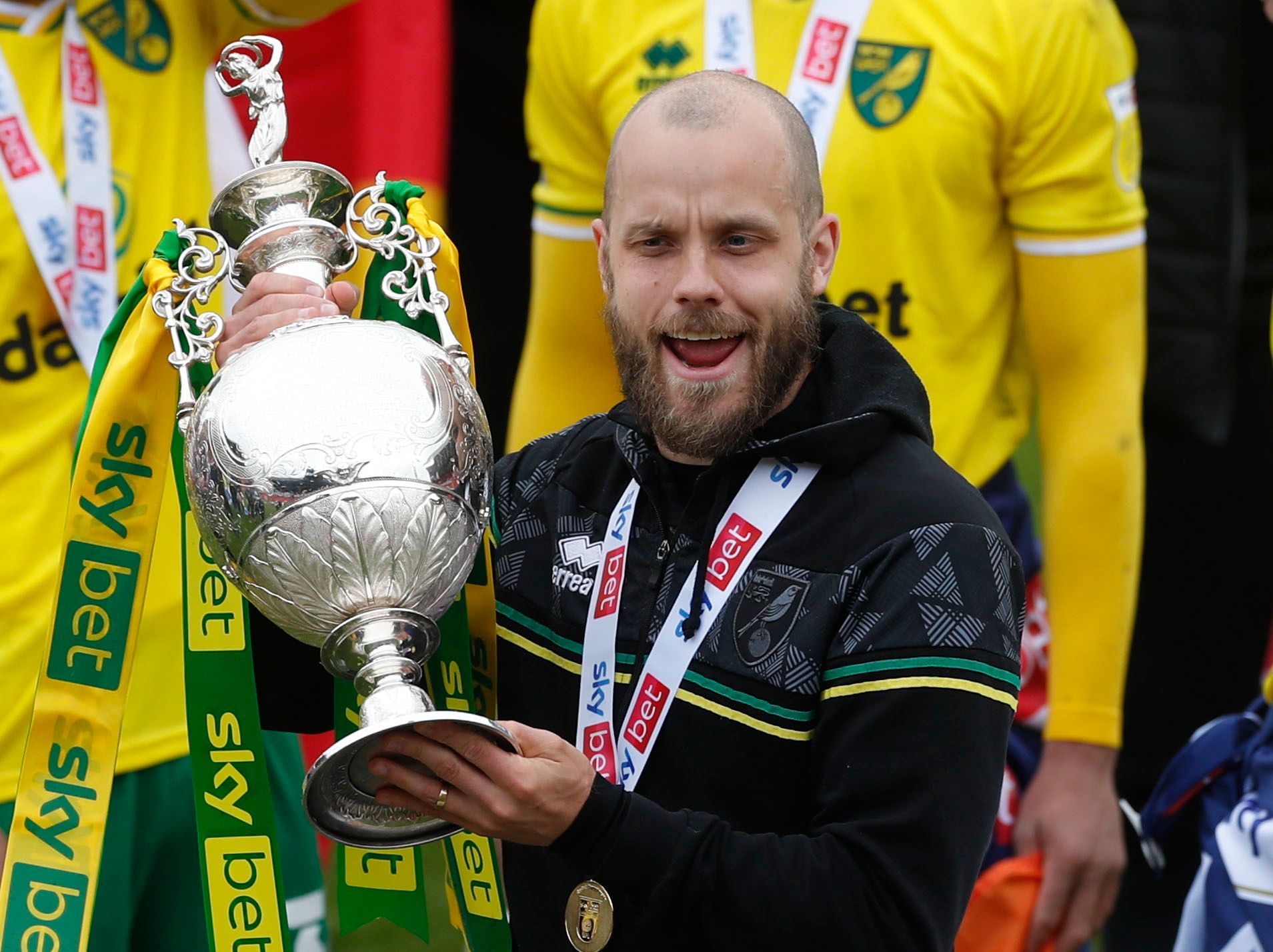 Soccer Football - Championship - Barnsley v Norwich City - Oakwell, Barnsley, Britain - May 8, 2021 Norwich City's Teemu Pukki celebrates winning the Championship with the trophy Action Images via Reuters/Lee Smith EDITORIAL USE ONLY. No use with unauthorized audio, video, data, fixture lists, club/league logos or 'live' services. Online in-match use limited to 75 images, no video emulation. No use in betting, games or single club /league/player publications.  Please contact your account represe
