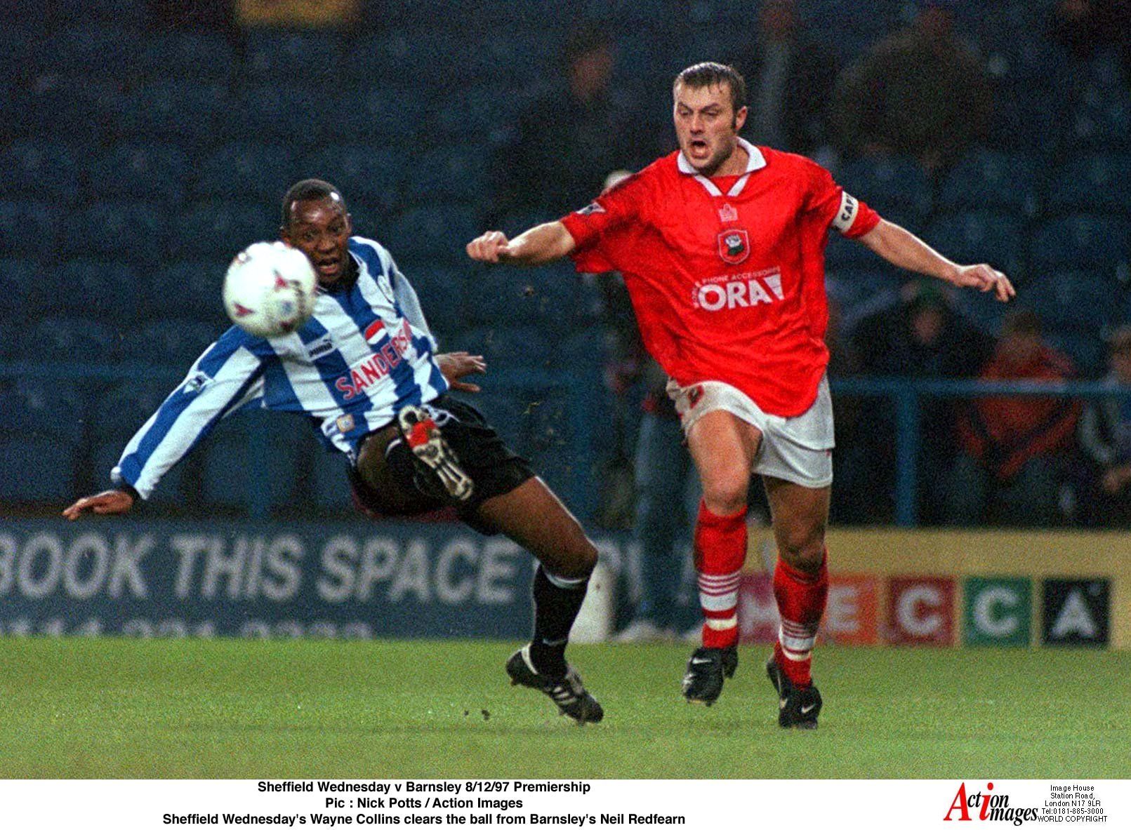Sheffield Wednesday v Barnsley 8/12/97 Premiership 
Pic : Nick Potts / Action Images 
Sheffield Wednesday's Wayne Collins clears the ball from Barnsley's Neil Redfearn