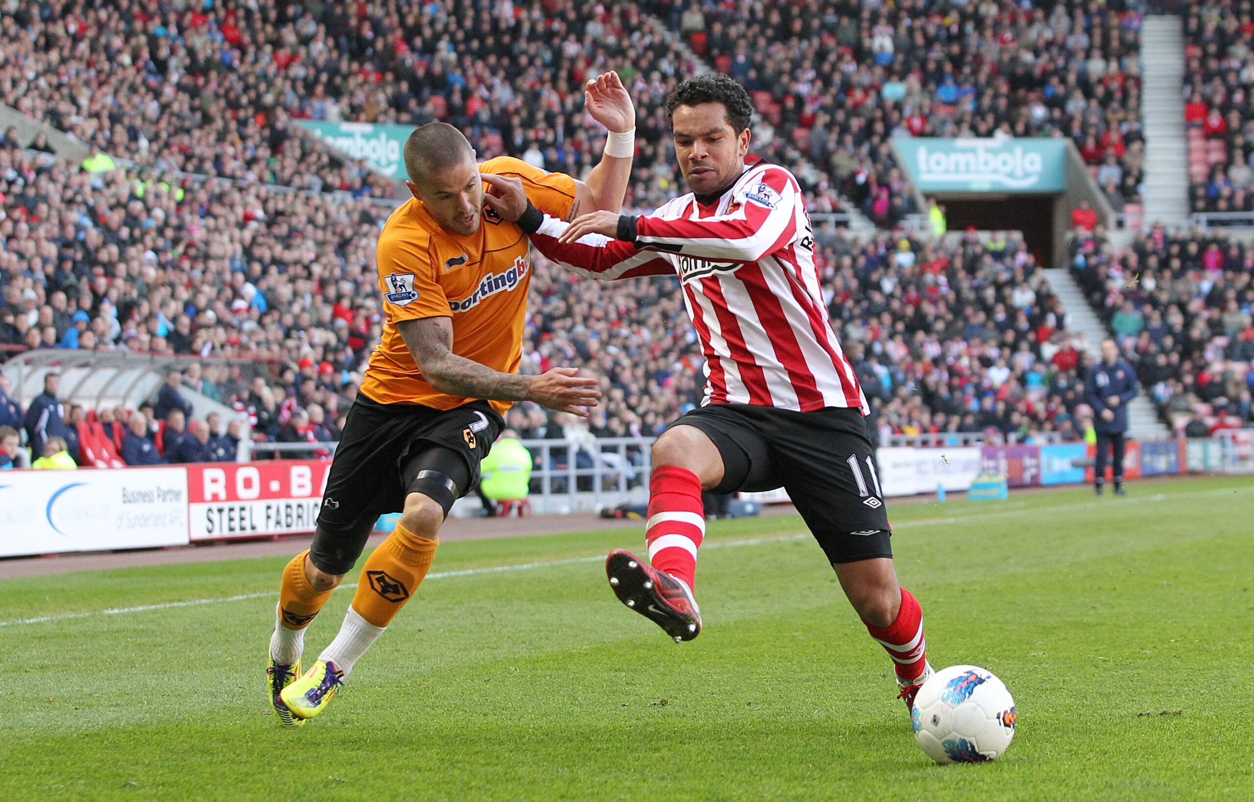 Football - Sunderland v Wolverhampton Wanderers Barclays Premier League  - Stadium of Light  - 14/4/12 
Michael Kightly of Wolves (L) and Kieran Richardson of Sunderland in action 
Mandatory Credit: Action Images / Ed Sykes 
Livepic 
EDITORIAL USE ONLY. No use with unauthorized audio, video, data, fixture lists, club/league logos or live services. Online in-match use limited to 45 images, no video emulation. No use in betting, games or single club/league/player publications.  Please contact your