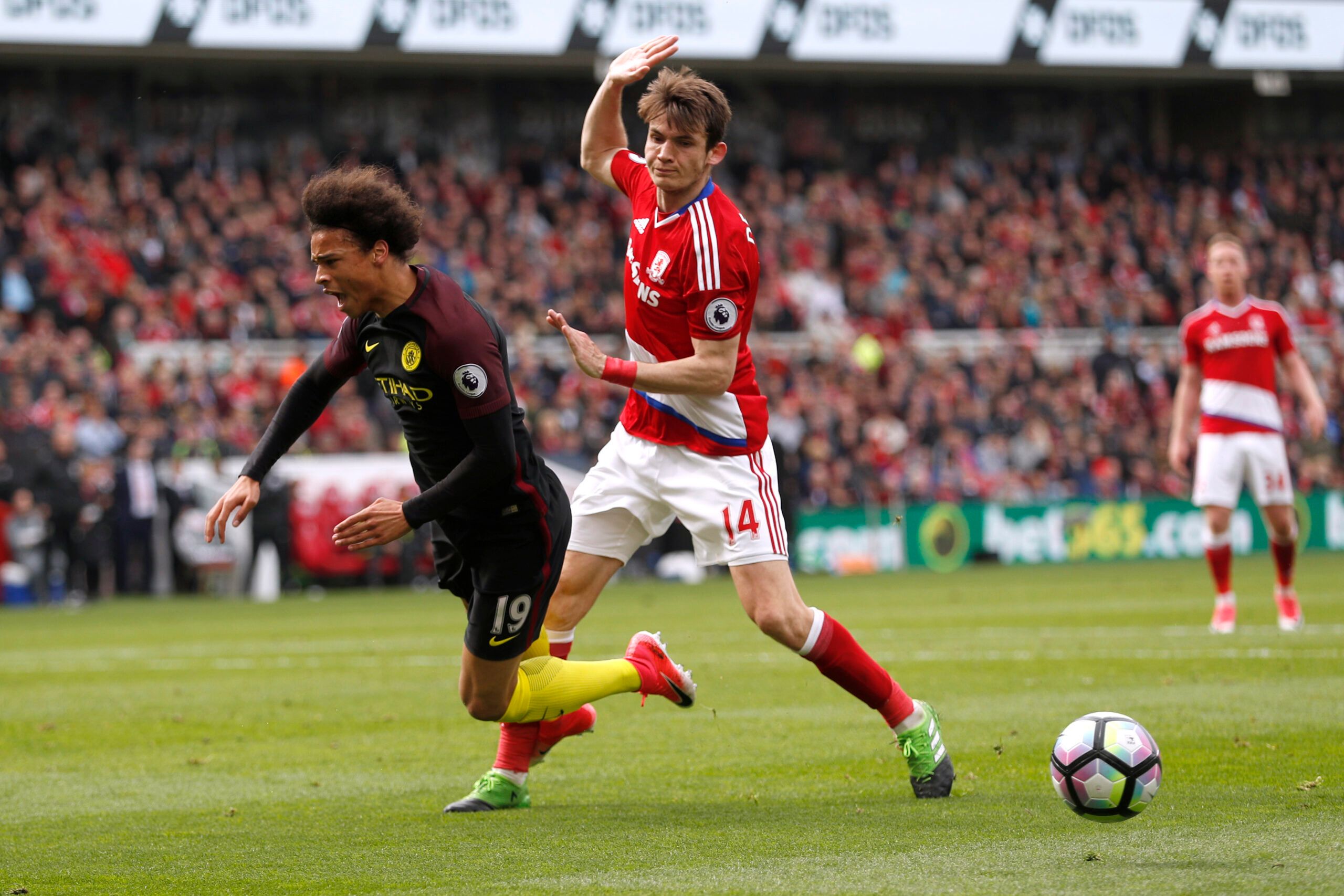 Britain Football Soccer - Middlesbrough v Manchester City - Premier League - The Riverside Stadium - 30/4/17 Middlesbrough's Marten De Roon concedes a penalty against Manchester City's Leroy Sane  Action Images via Reuters / Lee Smith Livepic EDITORIAL USE ONLY. No use with unauthorized audio, video, data, fixture lists, club/league logos or 