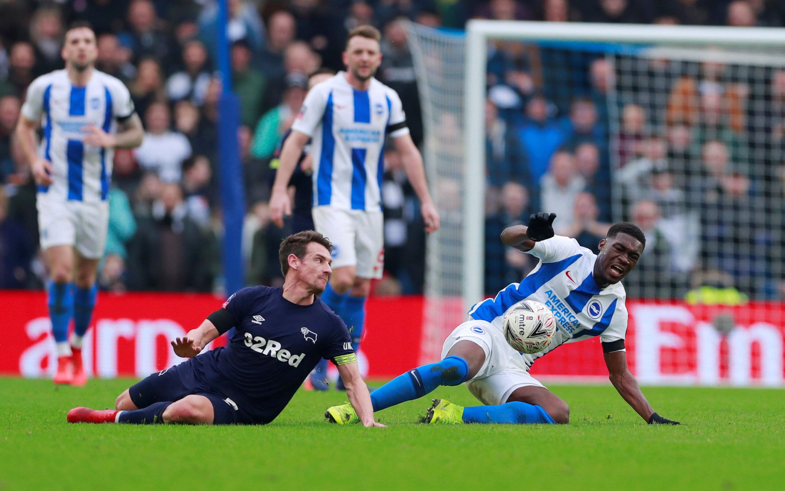 Soccer Football - FA Cup Fifth Round - Brighton &amp; Hove Albion v Derby County - The American Express Community Stadium, Brighton, Britain - February 16, 2019  Brighton's Yves Bissouma in action with Derby County's Craig Bryson   Action Images via Reuters/Andrew Couldridge