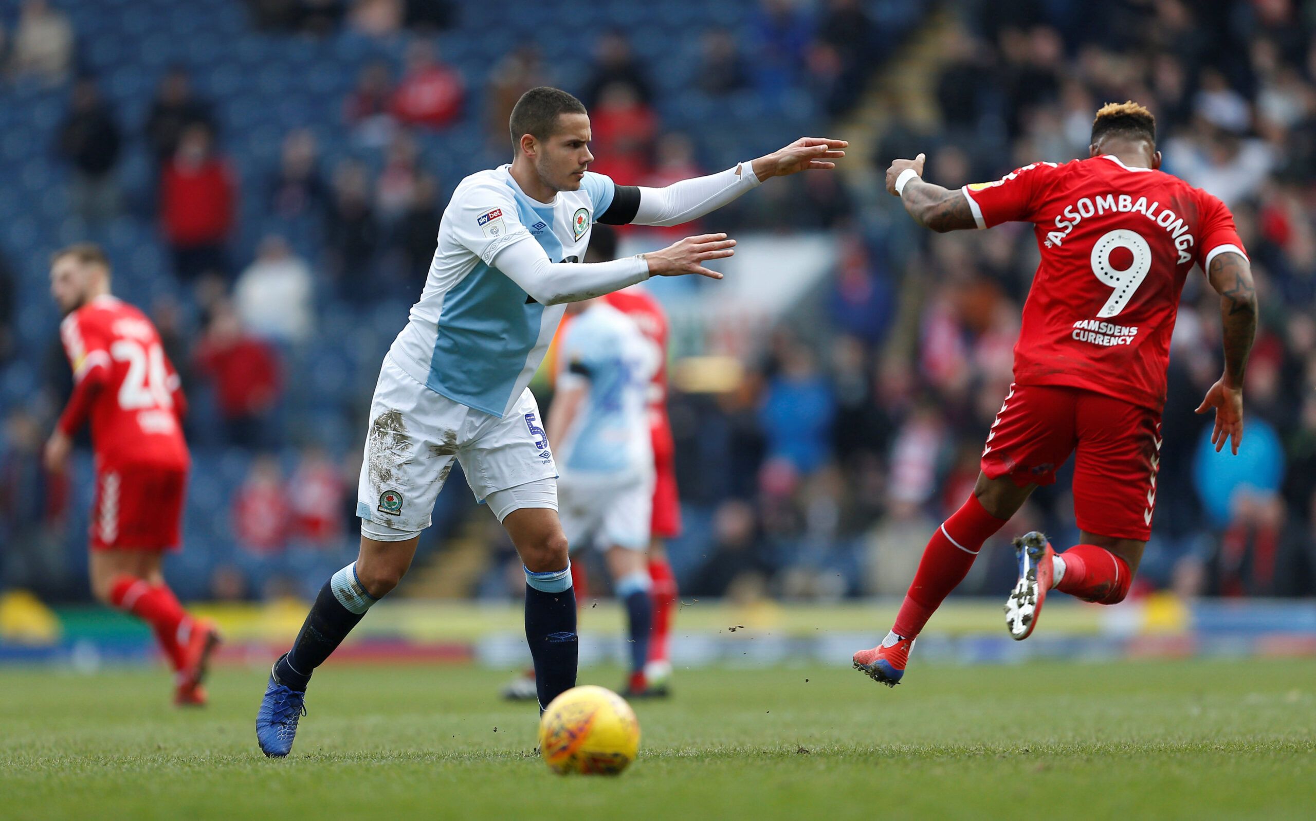 Soccer Football - Championship - Blackburn Rovers v Middlesbrough - Ewood Park, Blackburn, Britain - February 17, 2019   Blackburn Rovers' Jack Rodwell pushes Middlesbrough's Britt Assombalonga   Action Images/Craig Brough    EDITORIAL USE ONLY. No use with unauthorized audio, video, data, fixture lists, club/league logos or 