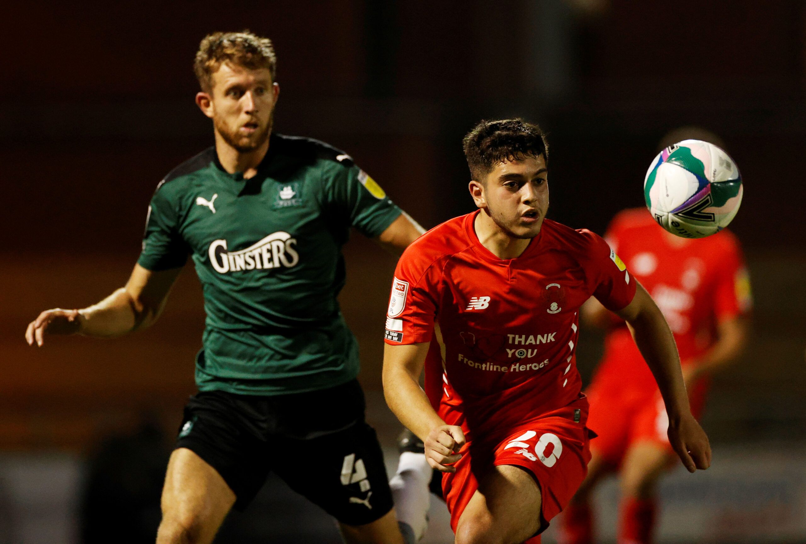 Soccer Football - Carabao Cup Second Round - Leyton Orient v Plymouth Argyle - Matchroom Stadium, London, Britain - September 15, 2020  Leyton Orient's Ruel Sotiriou in action with Plymouth Argyle's Will Aimson  Action Images/John Sibley  EDITORIAL USE ONLY. No use with unauthorized audio, video, data, fixture lists, club/league logos or 
