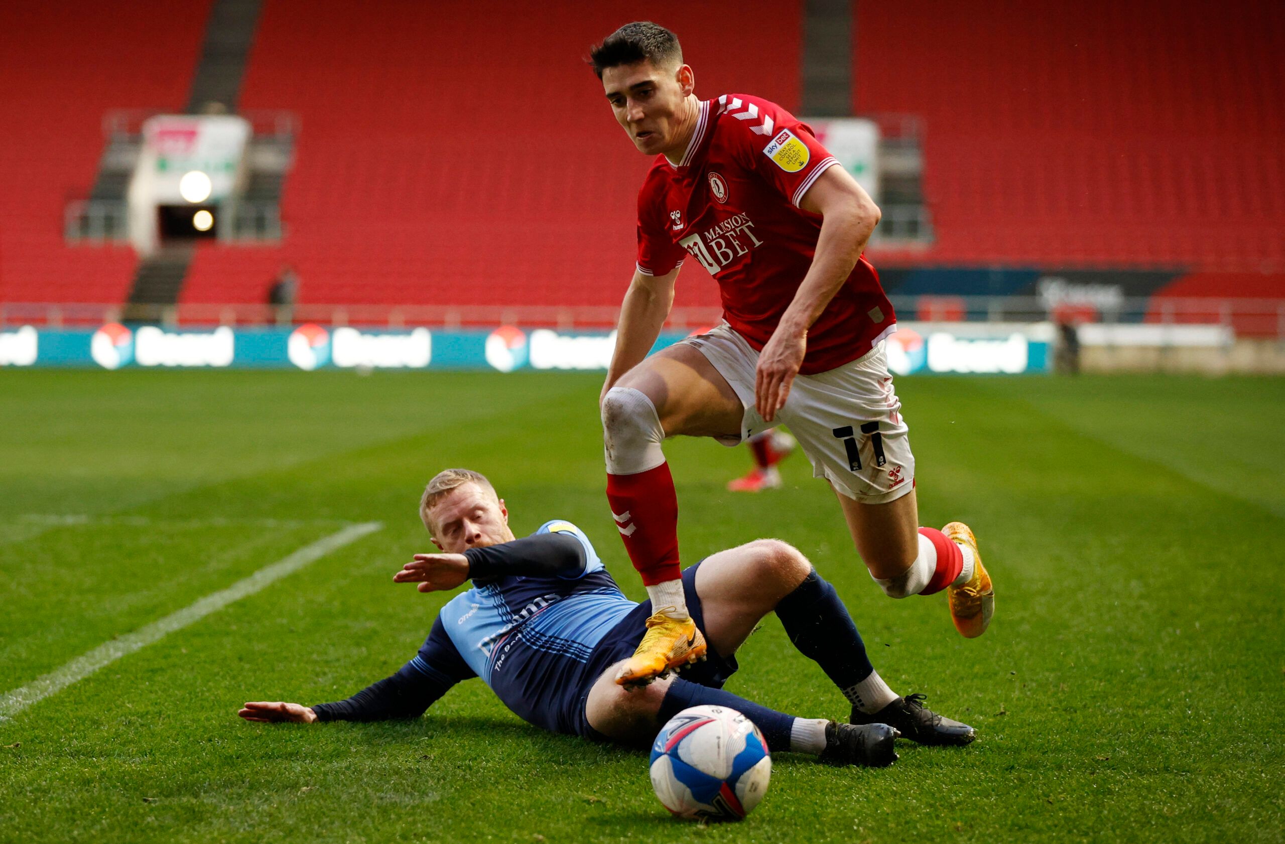 Soccer Football - Championship - Bristol City vs Wycombe Wanderers - Ashton Gate, Bristol, Britain - December 26, 2020 Bristol City's Callum O’Dowda in action with Wycombe Wanderers’ Daryl Horgan Action Images/John Sibley EDITORIAL USE ONLY. No use with unauthorized audio, video, data, fixture lists, club/league logos or 'live' services. Online in-match use limited to 75 images, no video emulation. No use in betting, games or single club /league/player publications.  Please contact your account 