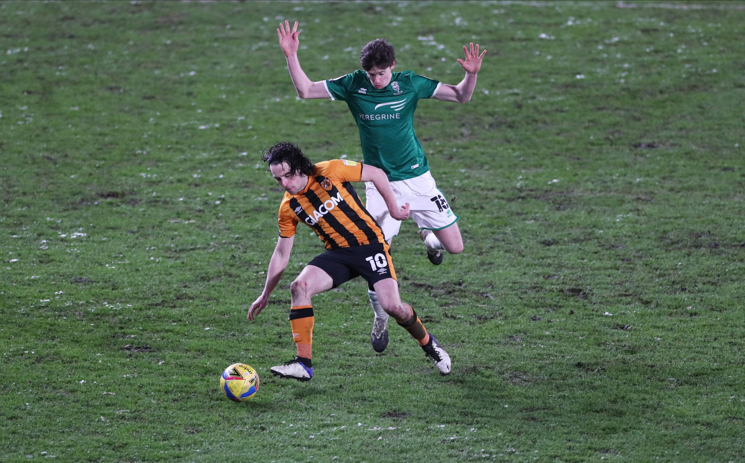 Soccer Football - League One - Hull City v Lincoln City - KCOM Stadium, Hull, Britain - February 9, 2021 Hull City's George Honeyman in action with Lincoln City's Conor McGrandles Action Images/Lee Smith EDITORIAL USE ONLY. No use with unauthorized audio, video, data, fixture lists, club/league logos or 'live' services. Online in-match use limited to 75 images, no video emulation. No use in betting, games or single club /league/player publications.  Please contact your account representative for