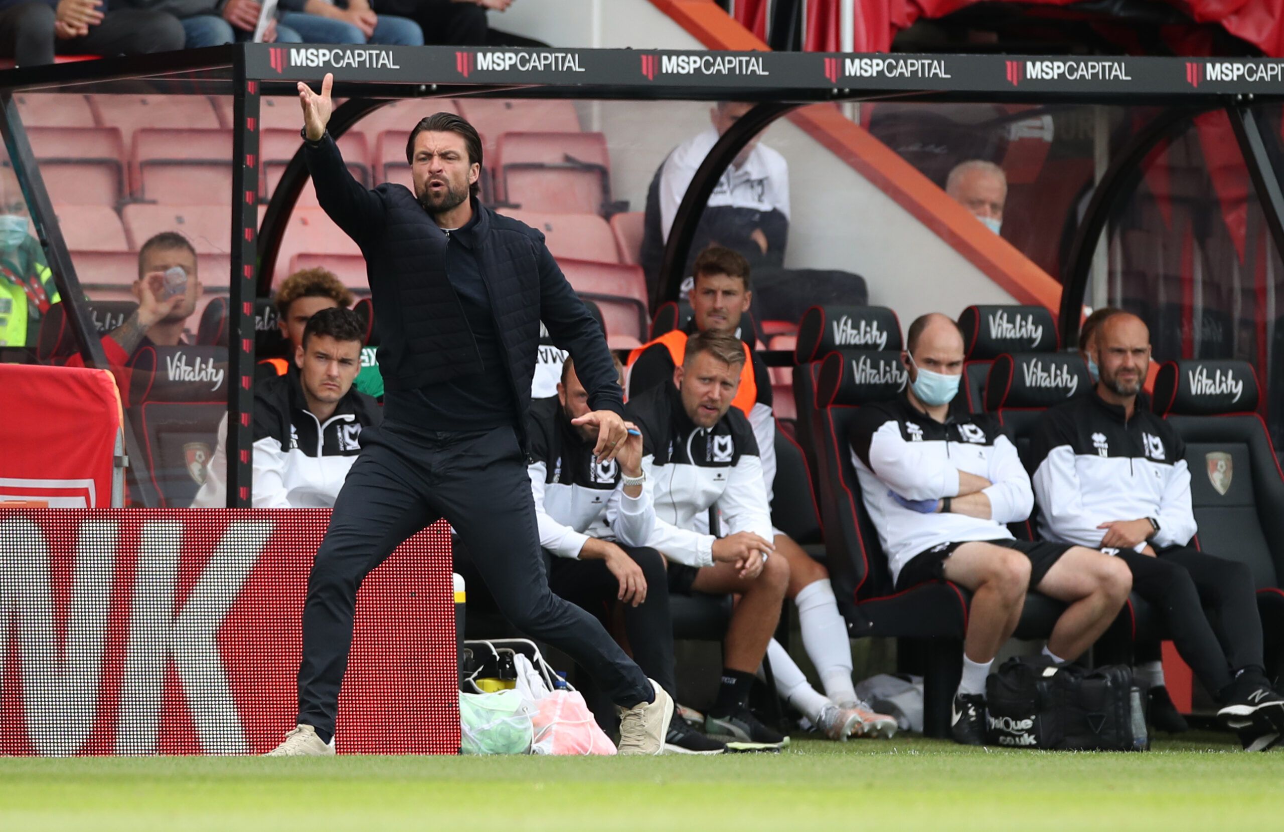 Soccer Football - Carabao Cup First Round - AFC Bournemouth v Milton Keynes Dons - Vitality Stadium, Bournemouth, Britain - July 31, 2021  Milton Keynes Dons manager Russell Martin reacts Action Images/Peter Cziborra
